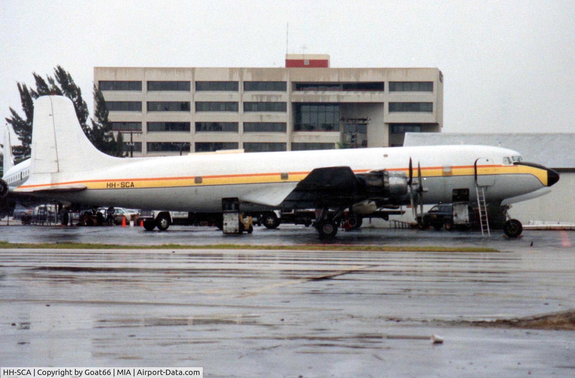 HH-SCA, Douglas DC-6BF C/N 45225, Looking very smart as she's loaded for another flight, MIA March 1990