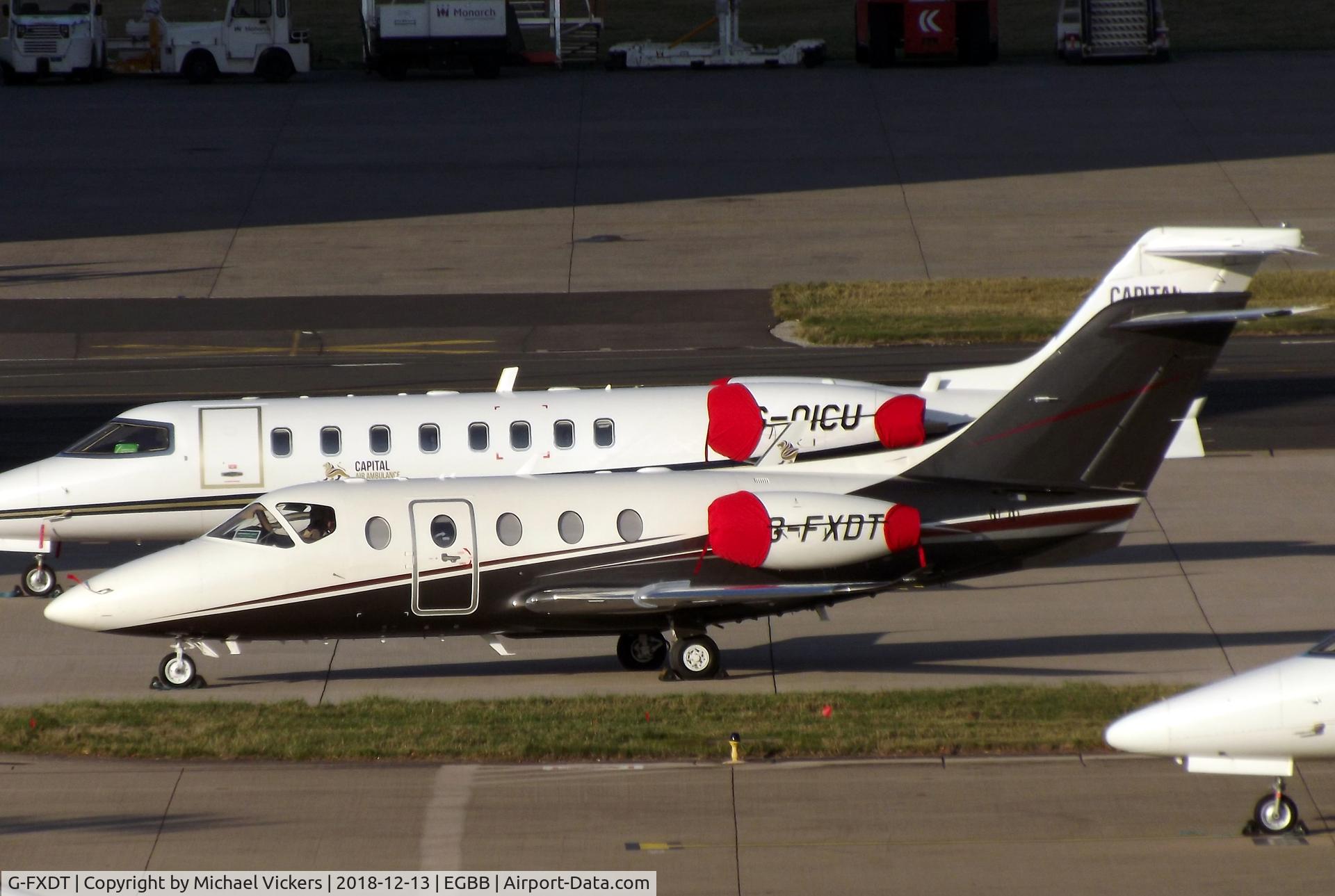 G-FXDT, 2004 Raytheon Beechjet 400A/Nextant N400XT C/N RK-397, on the XLR Biz ramp at BHX