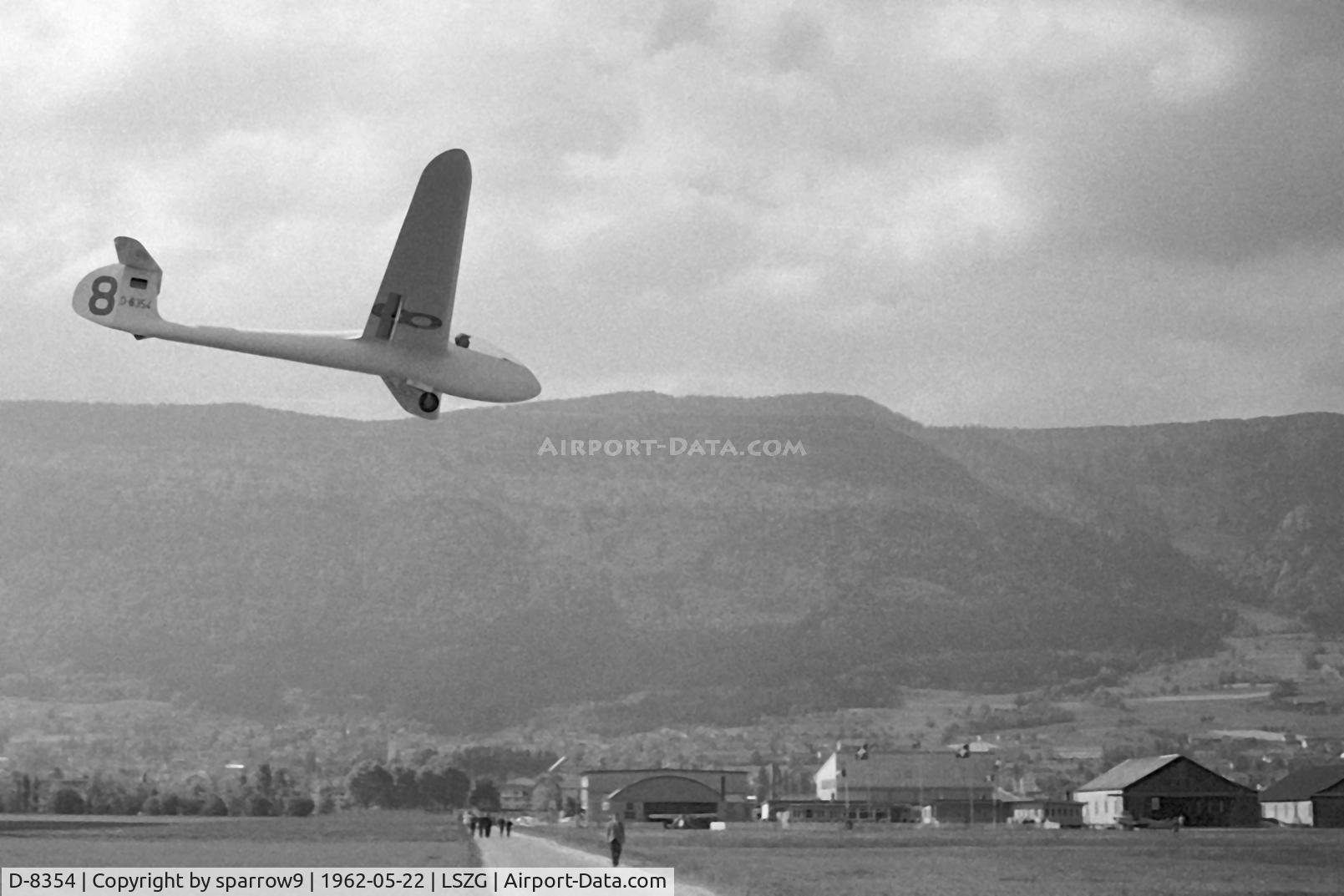 D-8354, 1960 Bolkow FS-24 Phonix T C/N 403, Final runway 05 Grenchen. Oldest hangar on the left. Scanned from a b+w-negative