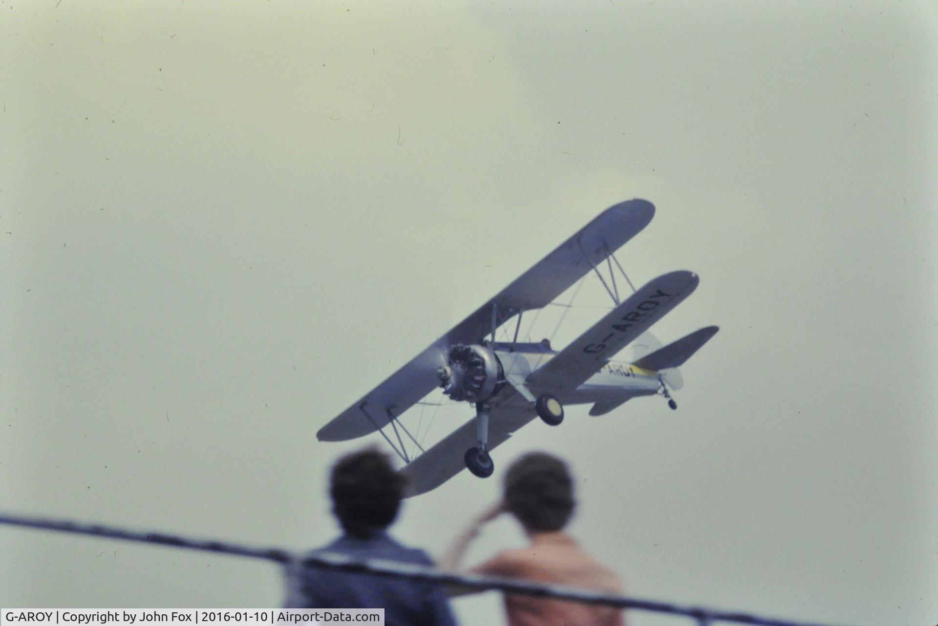 G-AROY, 1942 Boeing PT-17 Kaydet (A75N1) C/N 75-4775, G-AROY over Silverstone in 1972 when it was owned and flown by  John Jordan of Jordan's flour millers of Biggleswade. John was also a racing driver but used to fly low over the paddock during the lunch break and flour-bomb fellow competitors! Happy days.