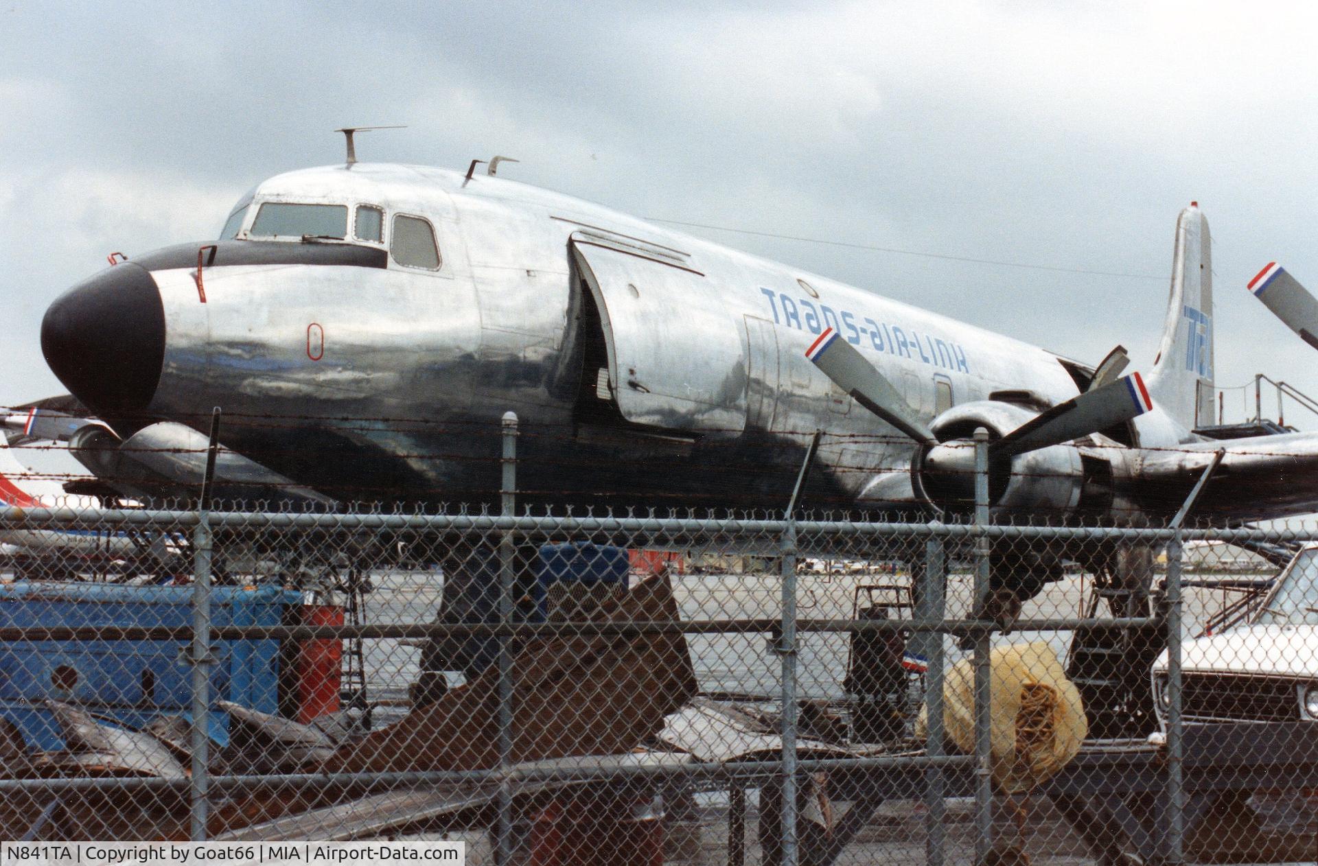N841TA, 1956 Douglas DC-6B C/N 44891, Still open for business, Miami, March 1990