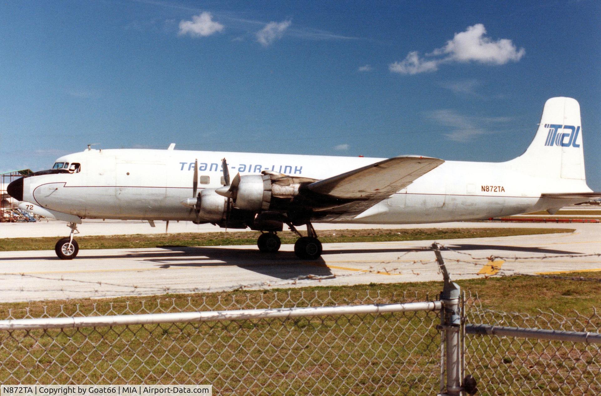 N872TA, 1953 Douglas C-118A Liftmaster (DC-6A) C/N 44668, Taxi-ing, Miami, March 1990.