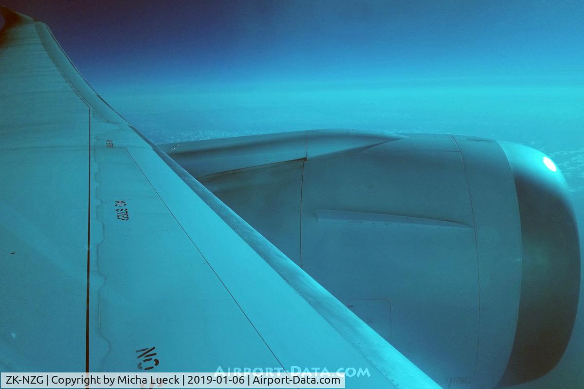 ZK-NZG, 2014 Boeing 787-9 Dreamliner Dreamliner C/N 37963, Colour cast from the dimmable window (KIX-AKL)