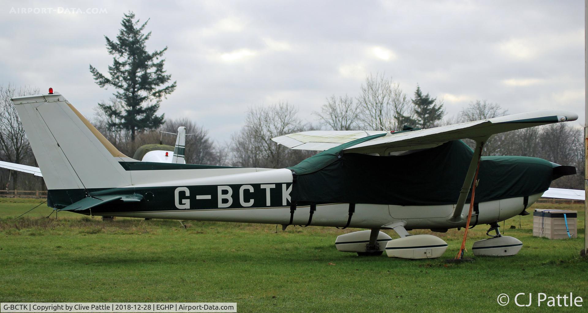G-BCTK, 1975 Reims FR172J Reims Rocket C/N 0546, Under wraps at Popham