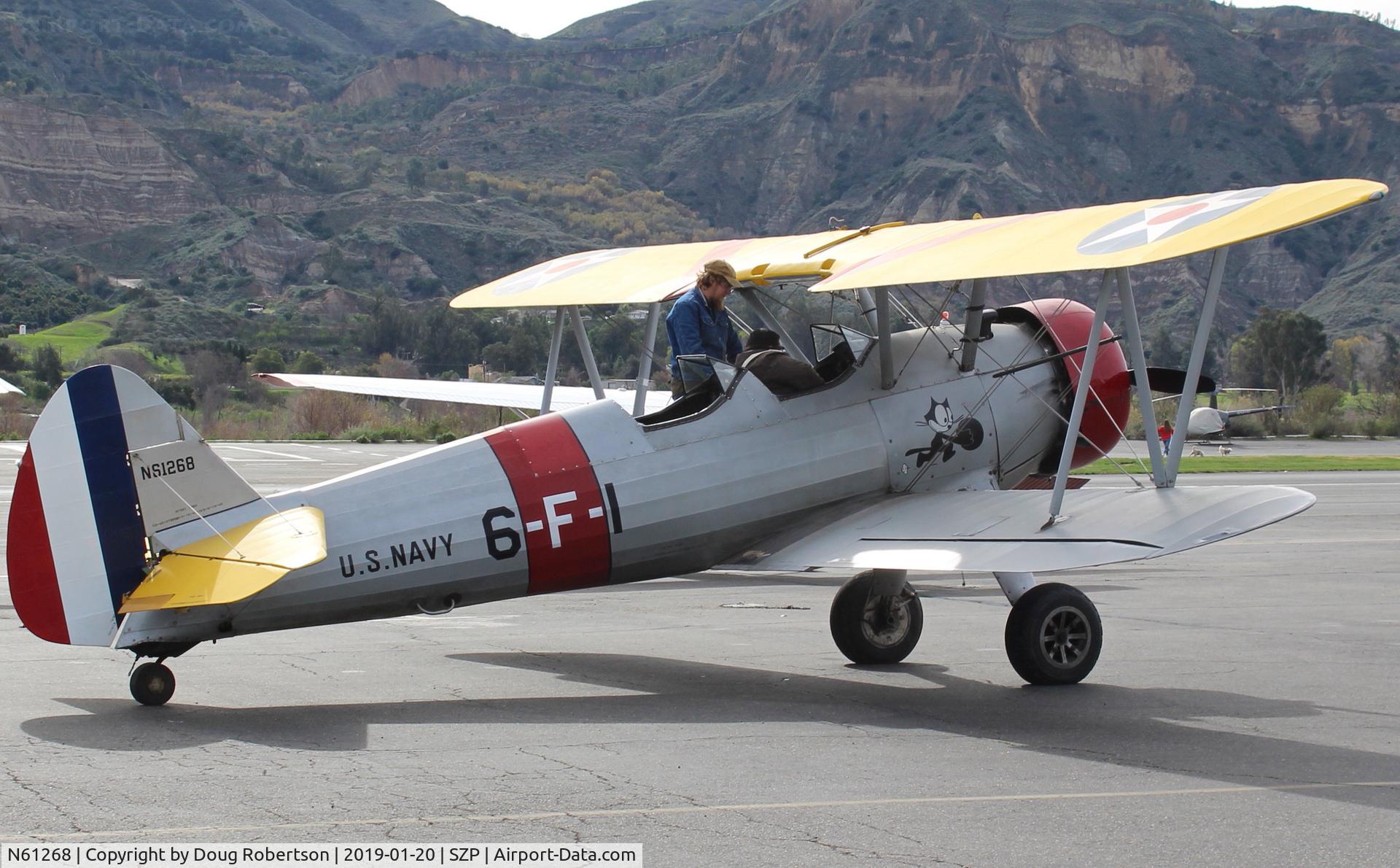 N61268, 1942 Boeing A75N1(PT17) C/N 75-3259, 1942 Boeing Stearman A75N1 (PT-17), Lycoming R680 radial-a first radial engine for Lycoming, boarding the aircraft near SZP's transient ramp