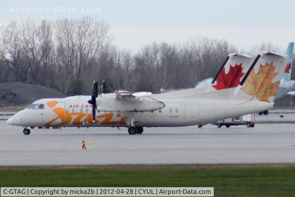 C-GTAG, 1990 De Havilland Canada DHC-8-301 Dash 8 C/N 200, Parked