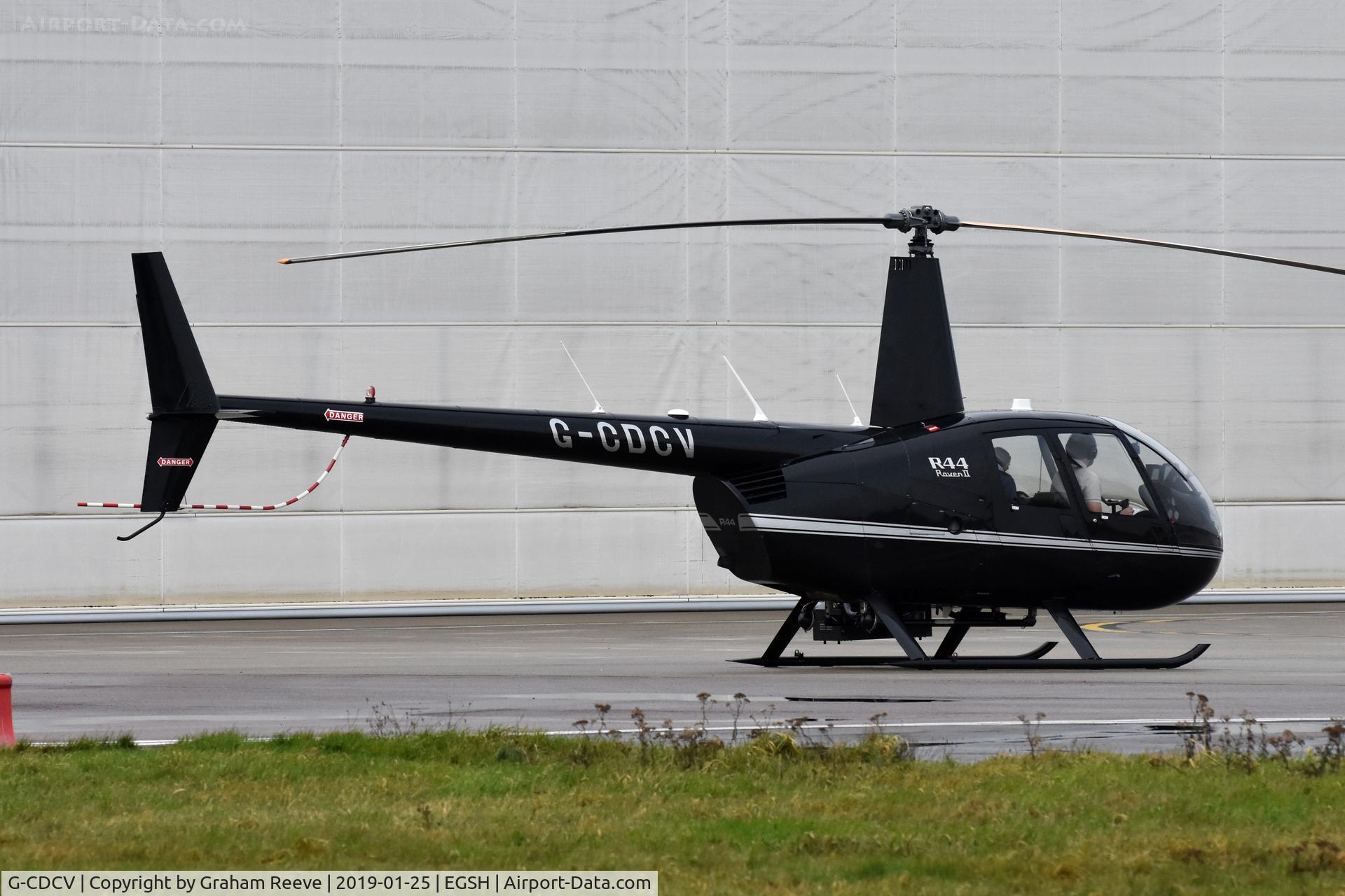 G-CDCV, 2004 Robinson R44 Raven II C/N 10536, About to depart from Norwich.