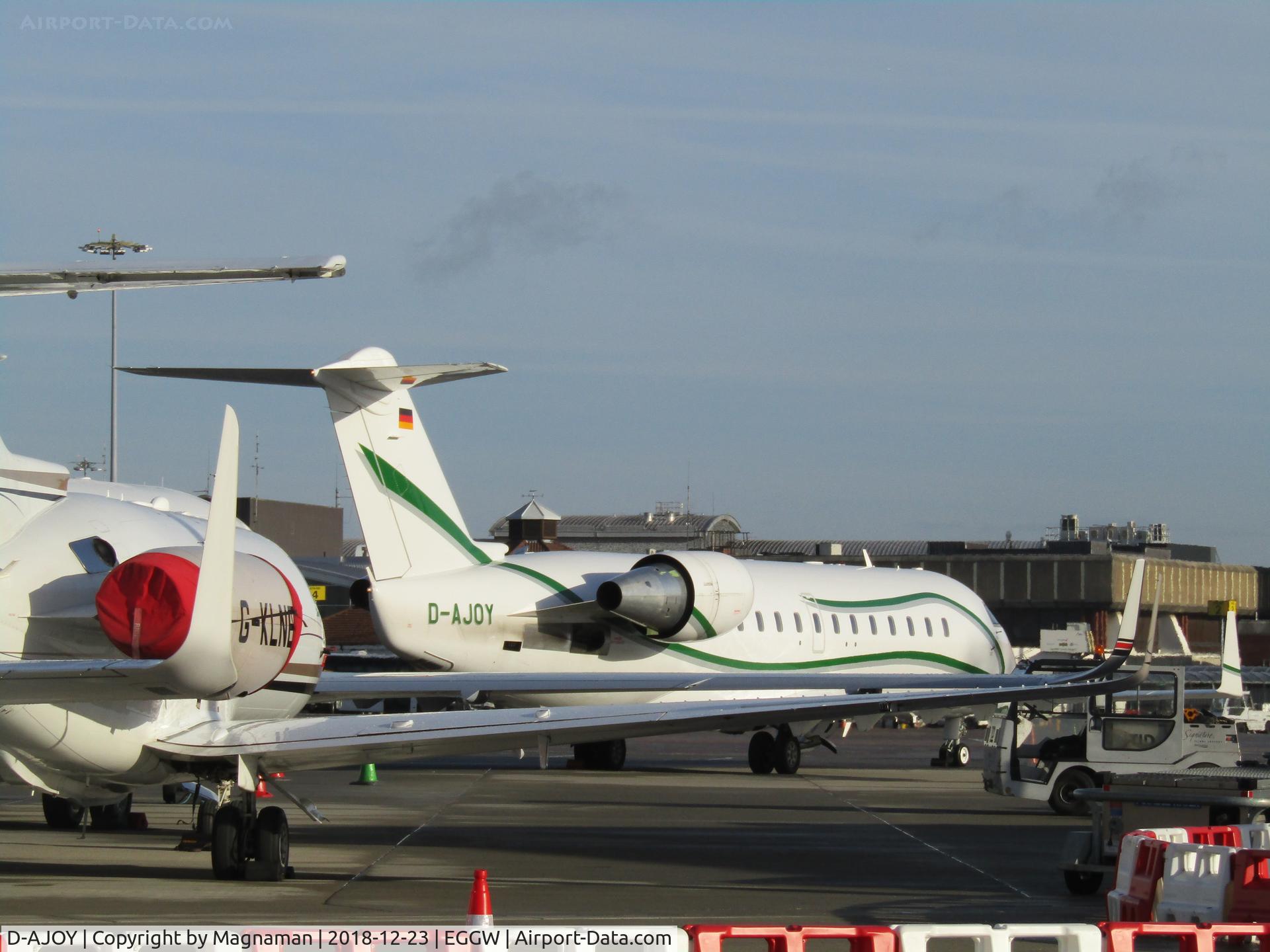 D-AJOY, 2007 Bombardier Challenger 850 (CL-600-2B19) C/N 8069, at LTN in winter sun