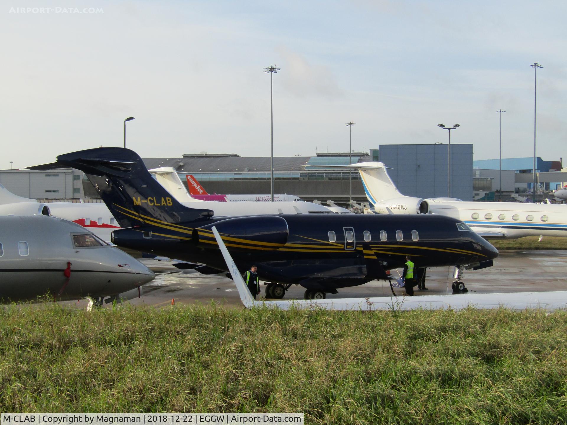 M-CLAB, 2009 Bombardier Challenger 300 (BD-100-1A10) C/N 20271, on apron at LTN
