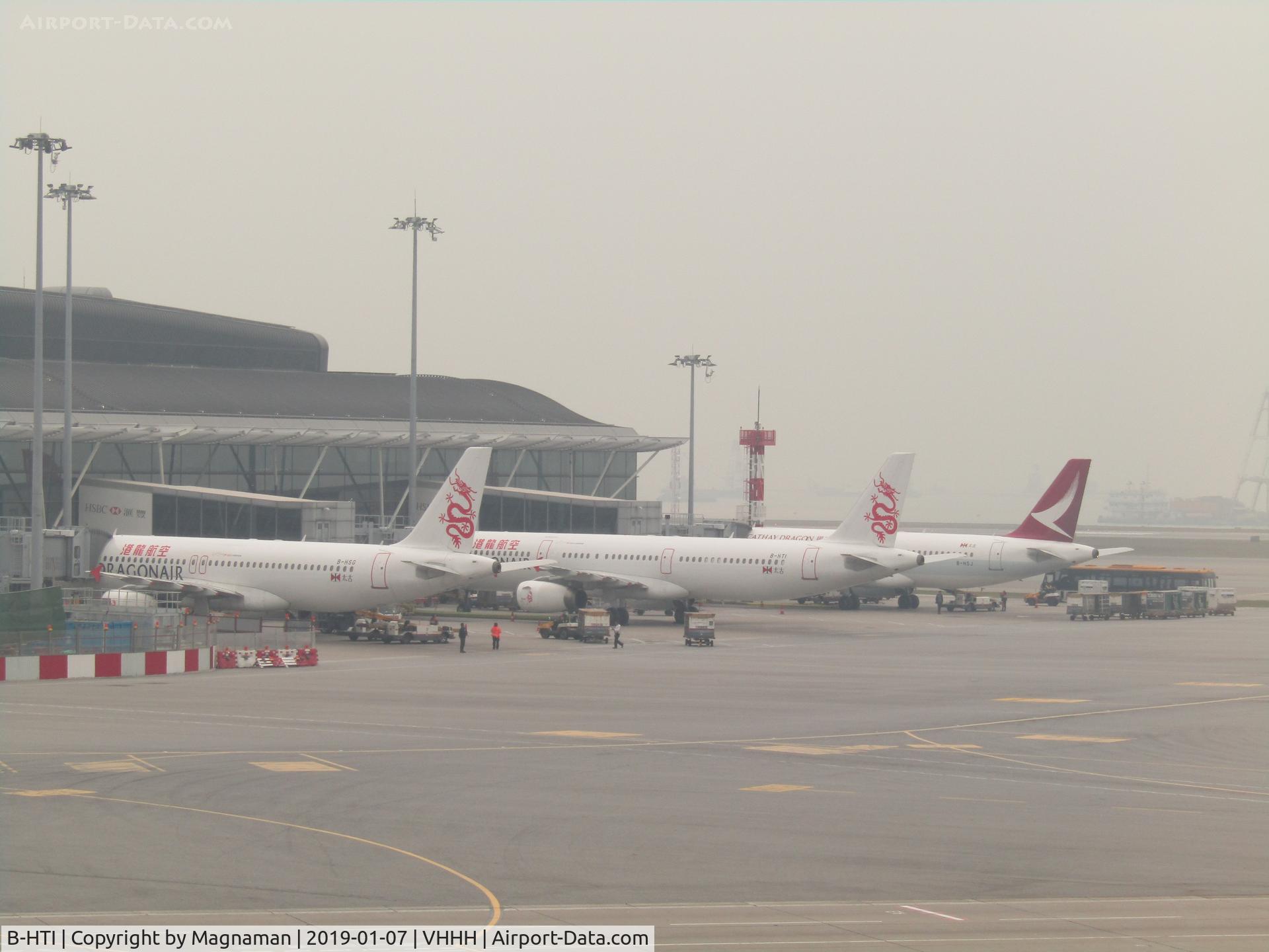 B-HTI, 2003 Airbus A321-231 C/N 2021, at HKG with pals