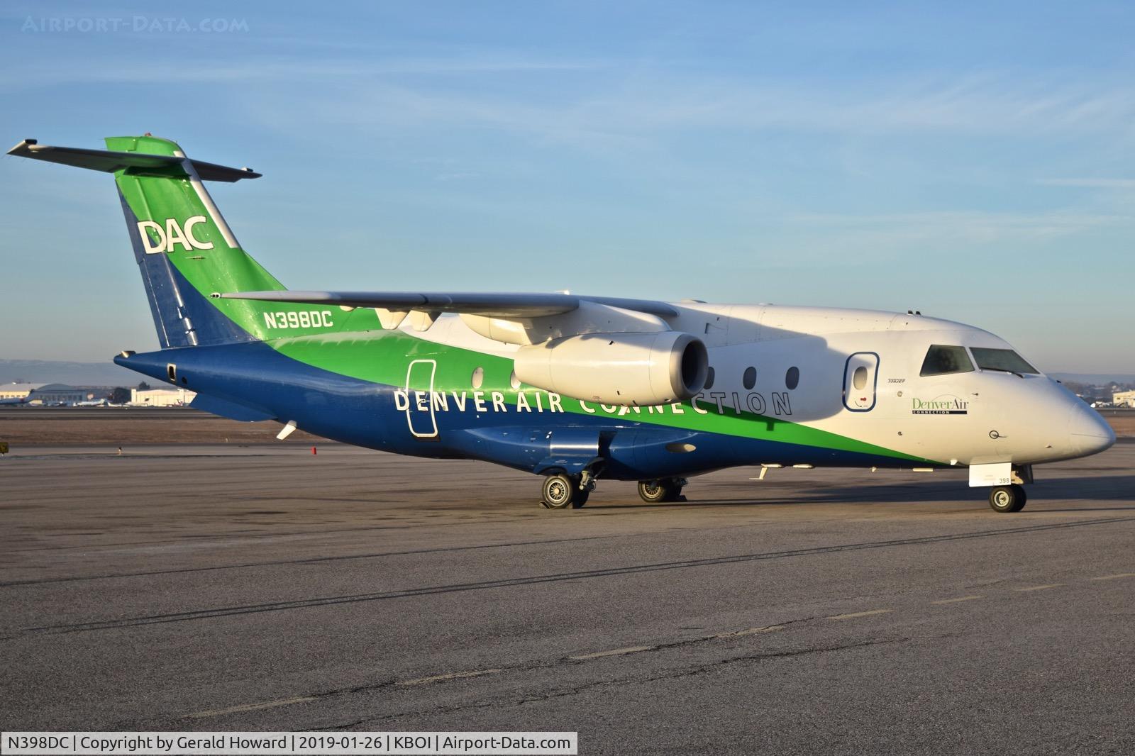 N398DC, 2002 Fairchild Dornier Do328-310JET C/N 3206, Parked on the north GA ramp.