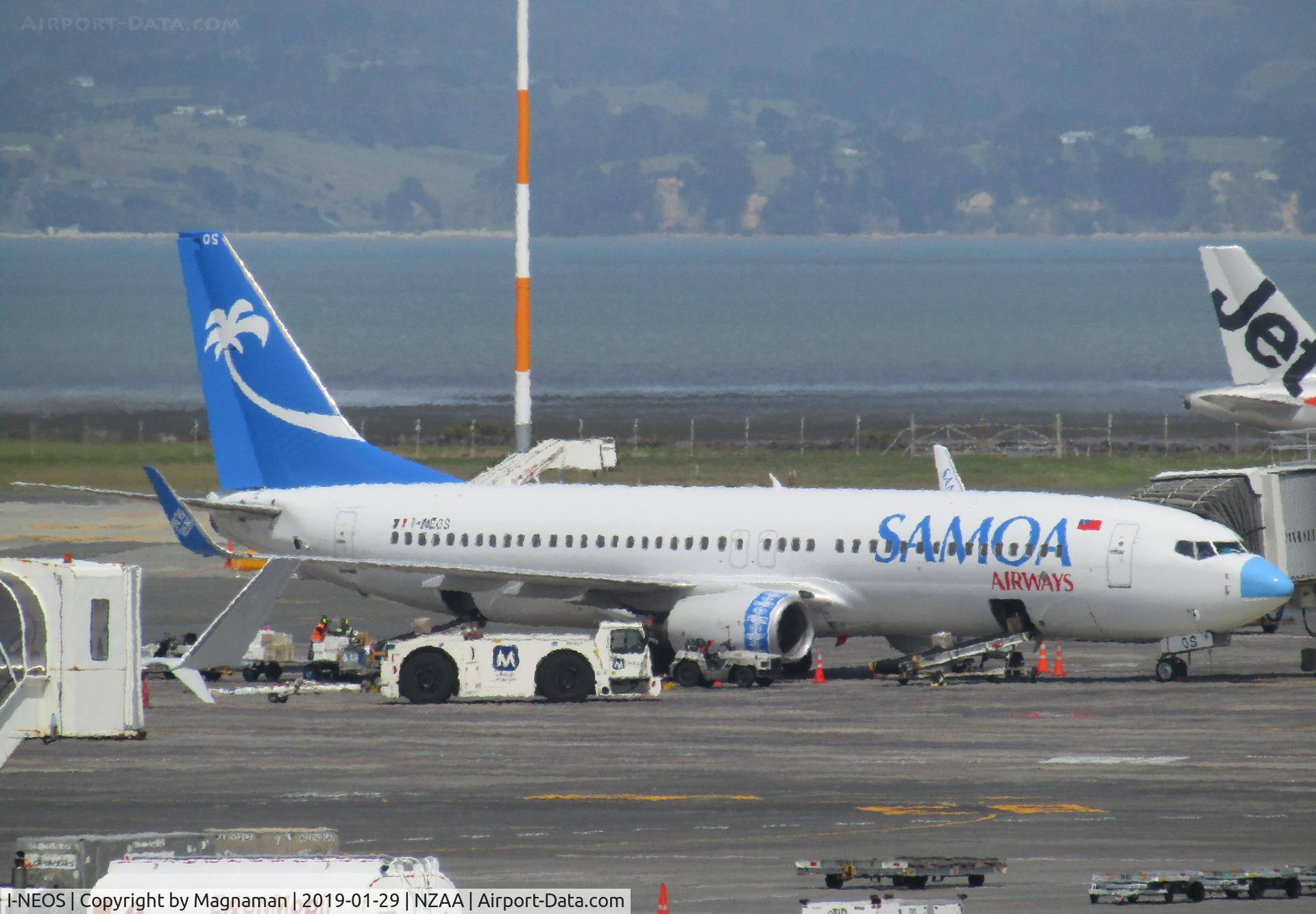 I-NEOS, 2002 Boeing 737-86N C/N 32733, on sunny stand at AKL