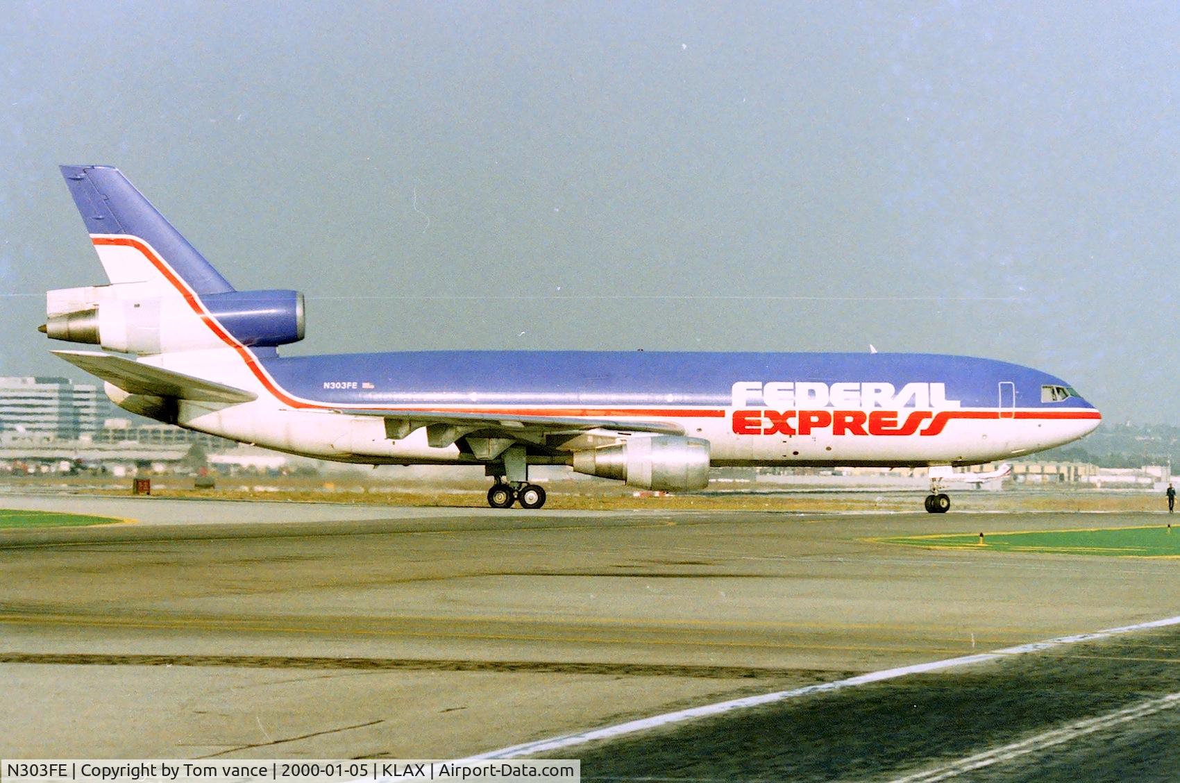 N303FE, 1973 McDonnell Douglas MD-10-30F C/N 46802, Federal Express DC-10-30F rolling off 25L at Los Angeles apprx March 1990