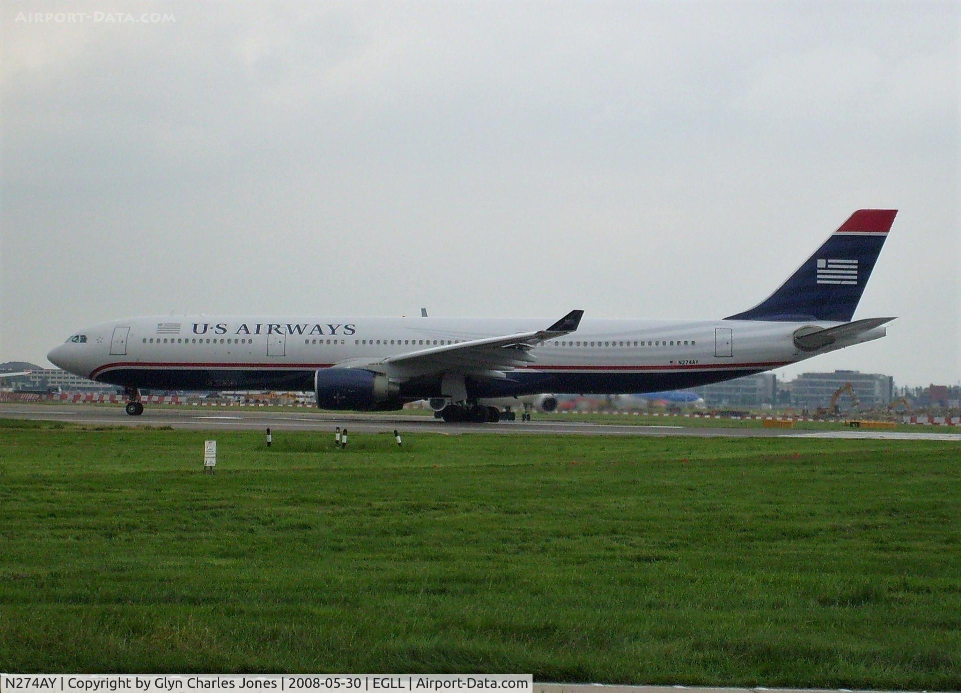 N274AY, 2000 Airbus A330-323X C/N 342, Previously N674UW and test registration F-WWYB. Lining up for take off on runway 27L. Operated by US Airways.