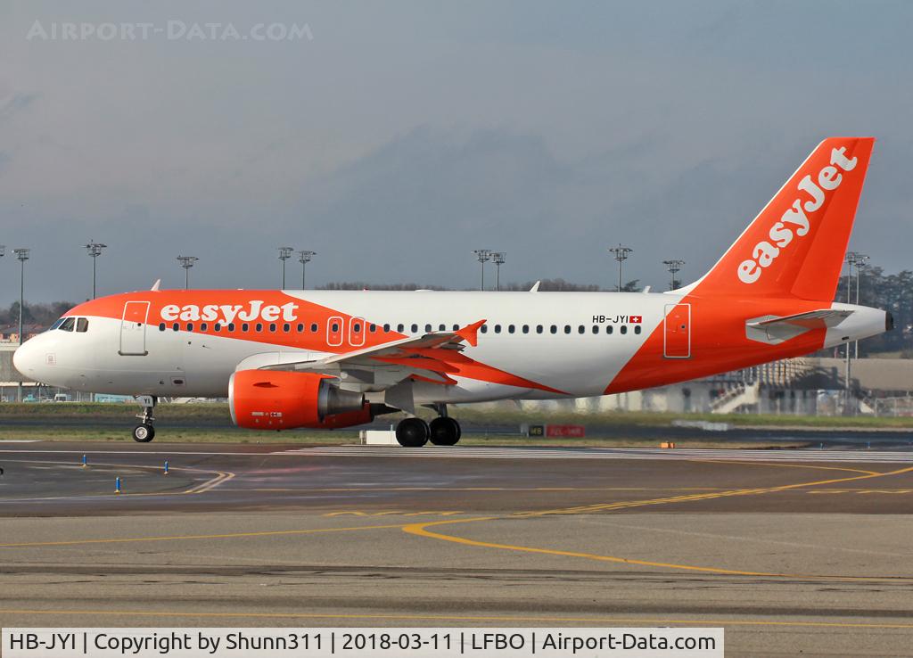 HB-JYI, 2011 Airbus A319-111 C/N 4744, Ready for departure from rwy 14L in new c/s