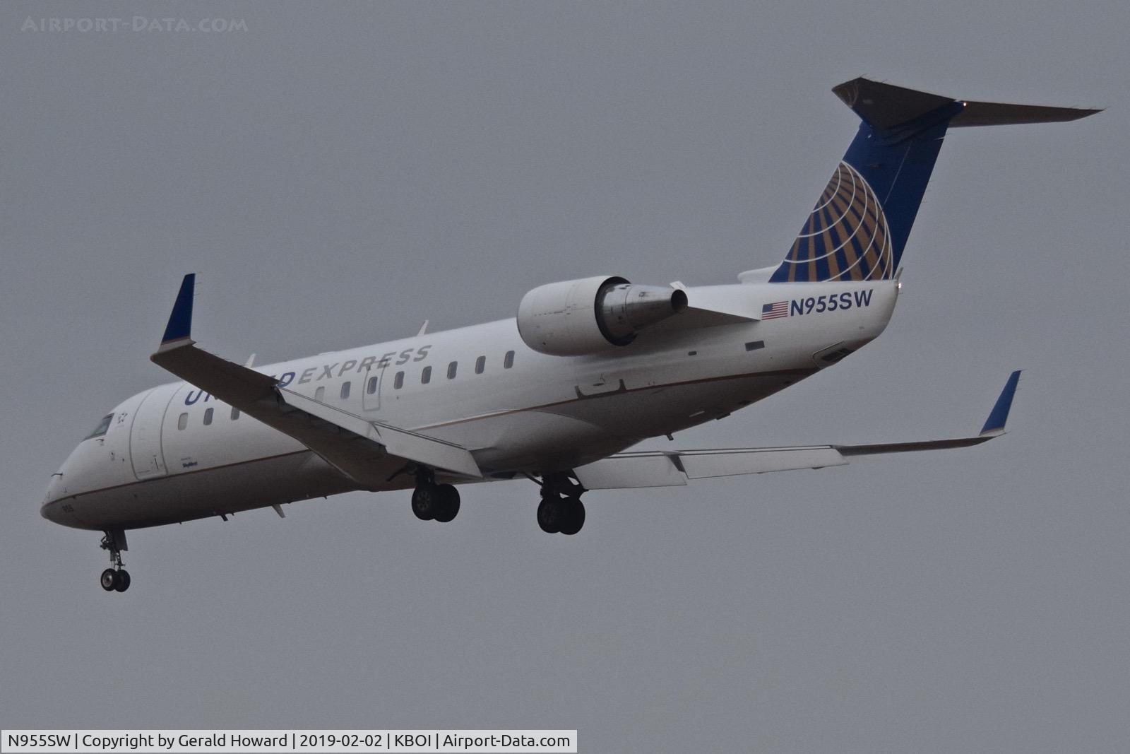 N955SW, 2003 Bombardier CRJ-200LR (CL-600-2B19) C/N 7817, Landing RWY 28R.