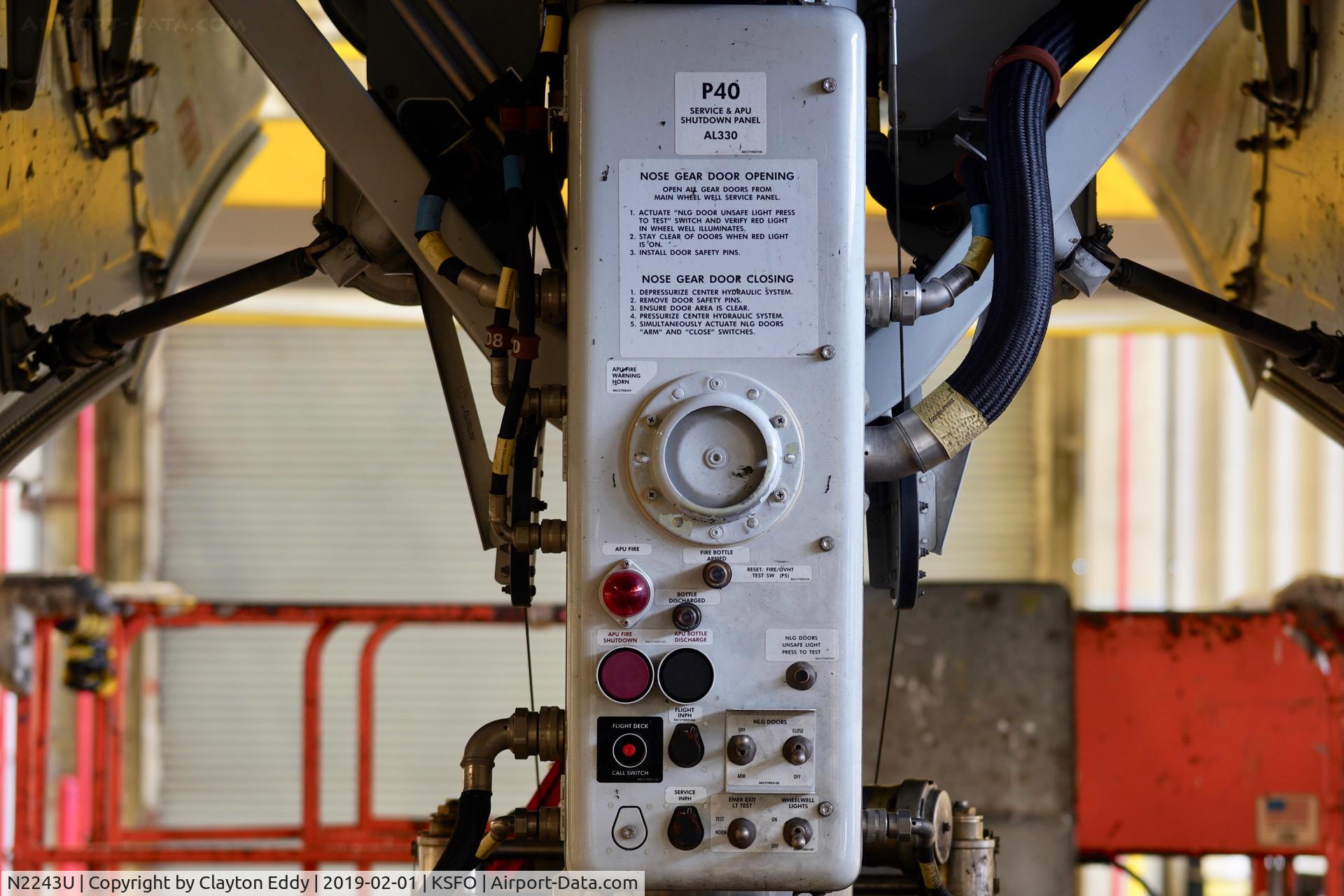 N2243U, 2017 Boeing 777-300/ER C/N 63723, Nose landing gear. SFO 2019.