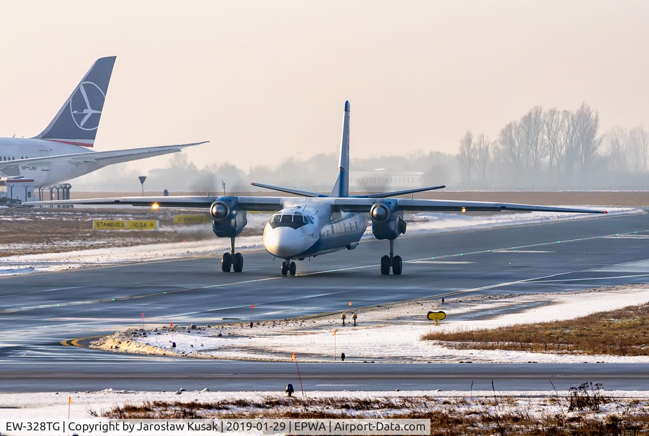 EW-328TG, 1983 Antonov An-26B-100 C/N 12806, An 26 connects to the belt 29 of the Chopin airport in Warsaw