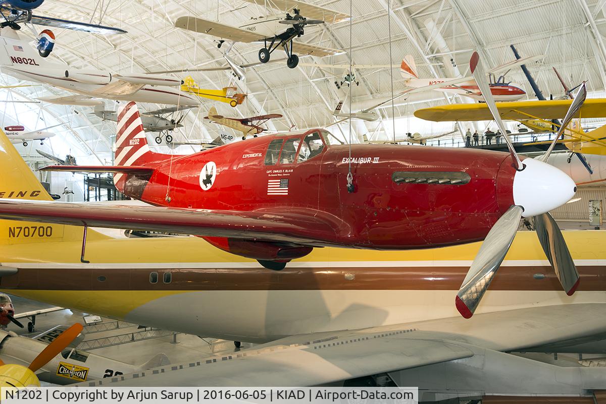 N1202, 1944 North American P-51C-10 Mustang C/N 111-29080, “Excalibur III” on display in the Boeing Aviation Hangar at Steven F. Udvar-Hazy Center, NASM. The Mustang belonged to Paul Mantz, who won the 1946 and 1947 Bendix races. Capt. C.F. Blair bought the aircraft and set several records.