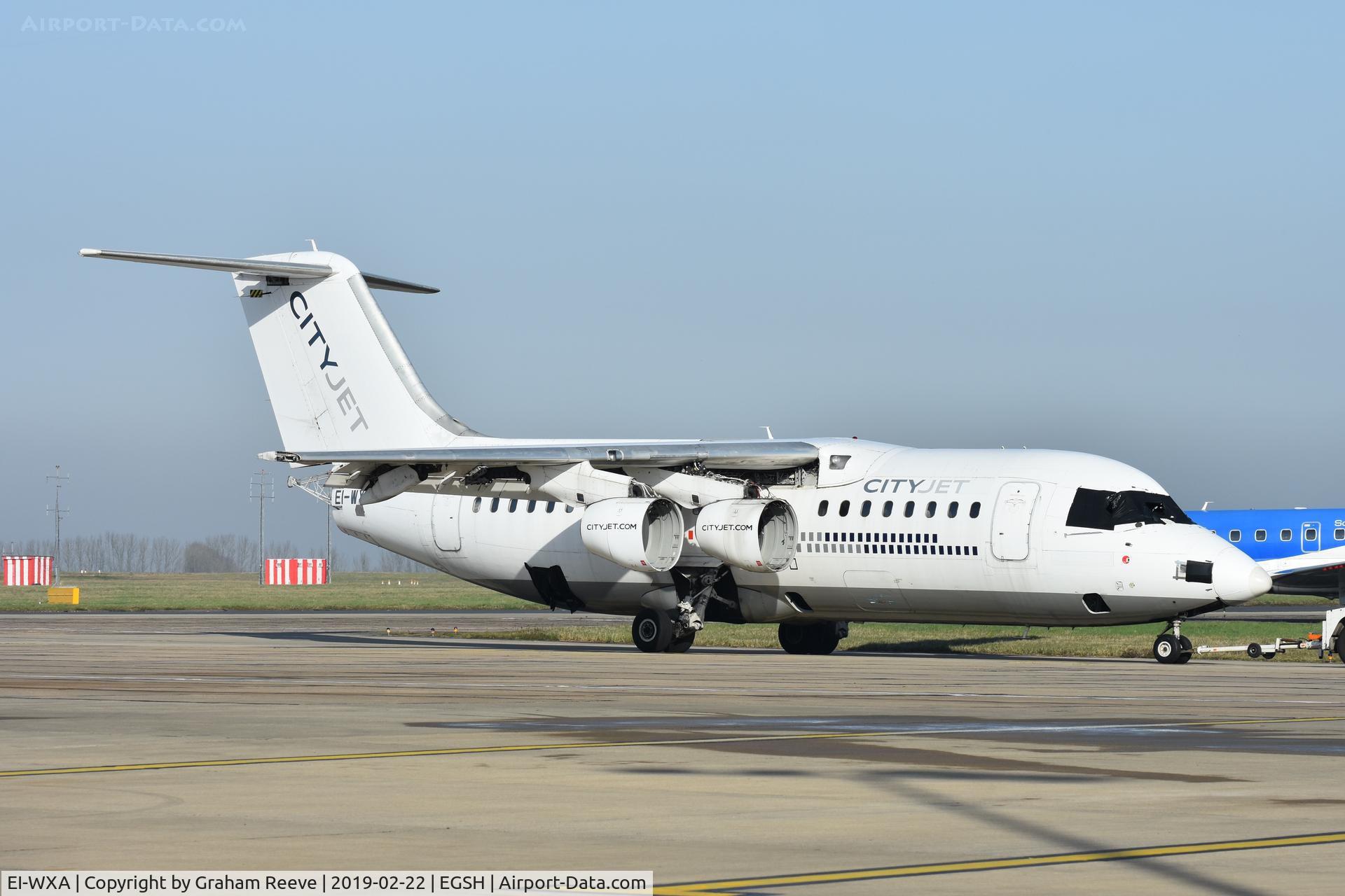 EI-WXA, 1997 British Aerospace Avro 146-RJ85A C/N E2310, Under tow at Norwich.