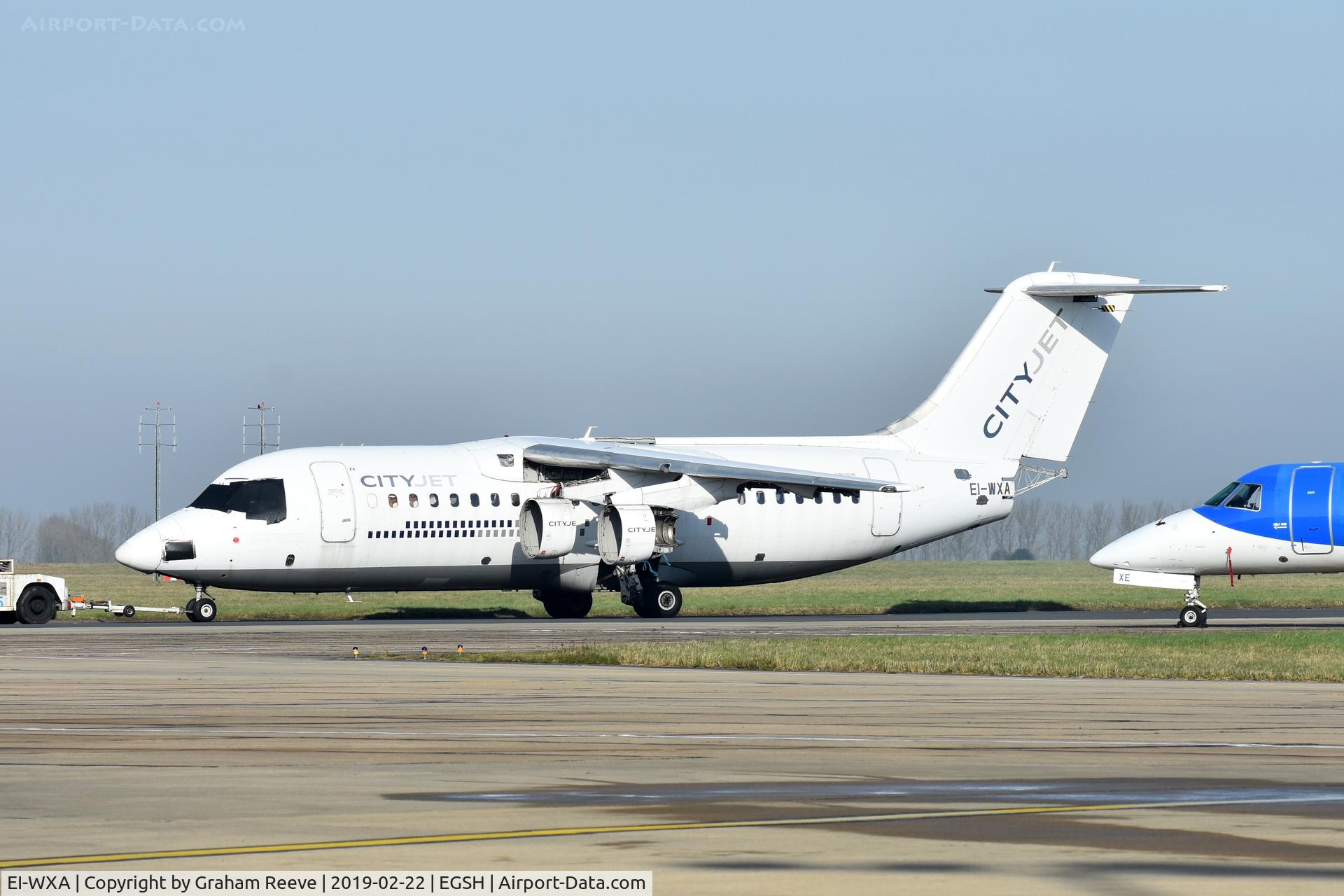 EI-WXA, 1997 British Aerospace Avro 146-RJ85A C/N E2310, Under tow at Norwich.