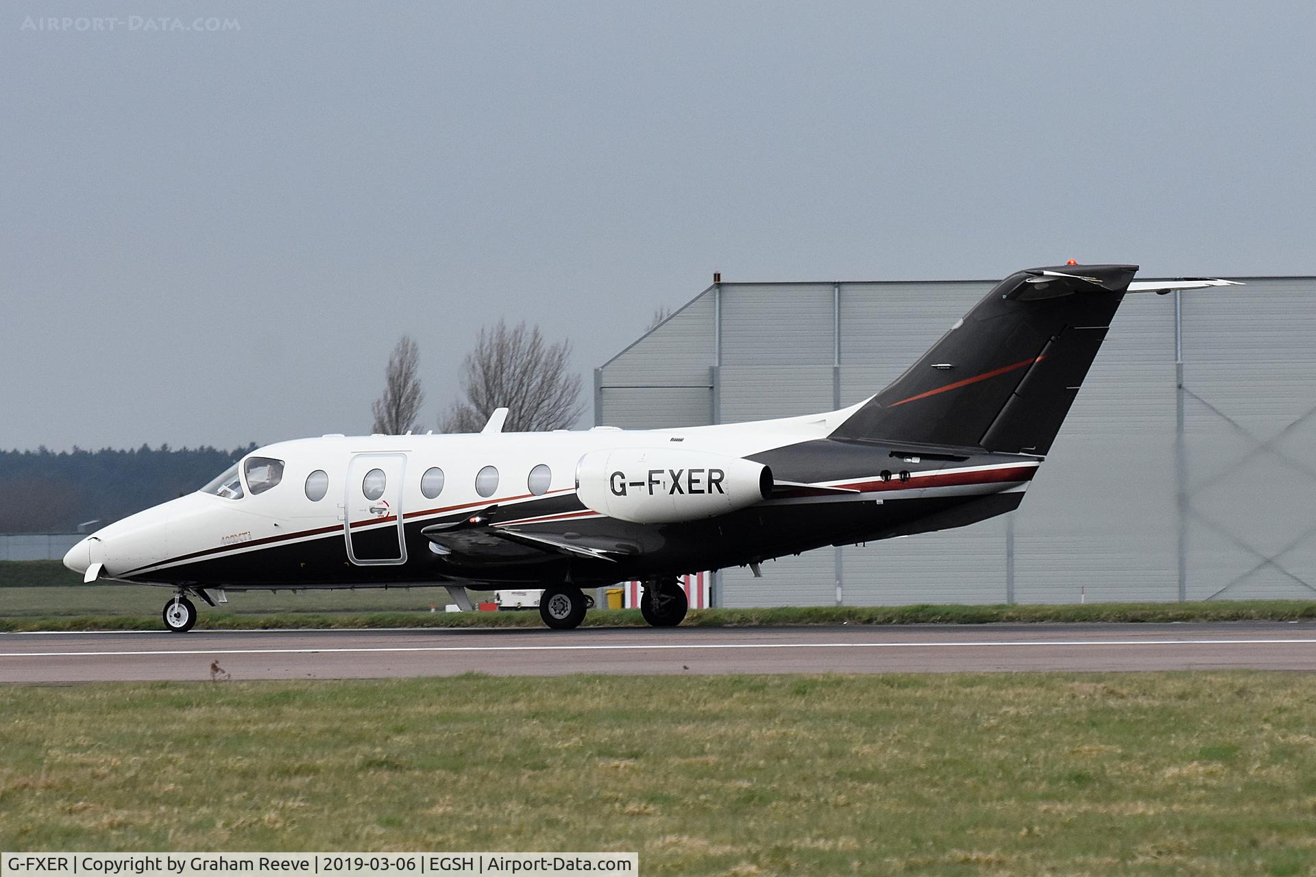 G-FXER, 2001 Raytheon Beechjet 400A/Nextant N400XT C/N RK-310, About to depart on Norwich's runway 