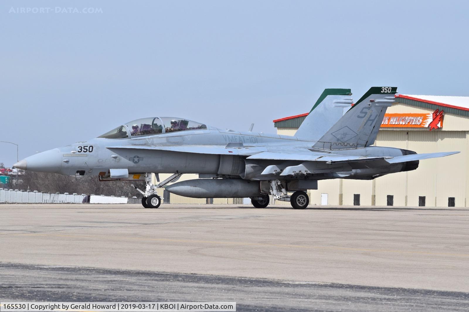 165530, Boeing F/A-18D Hornet C/N 1472, Taxiing from the north GA ramp to RWY 10L.  VMFAT-101 
