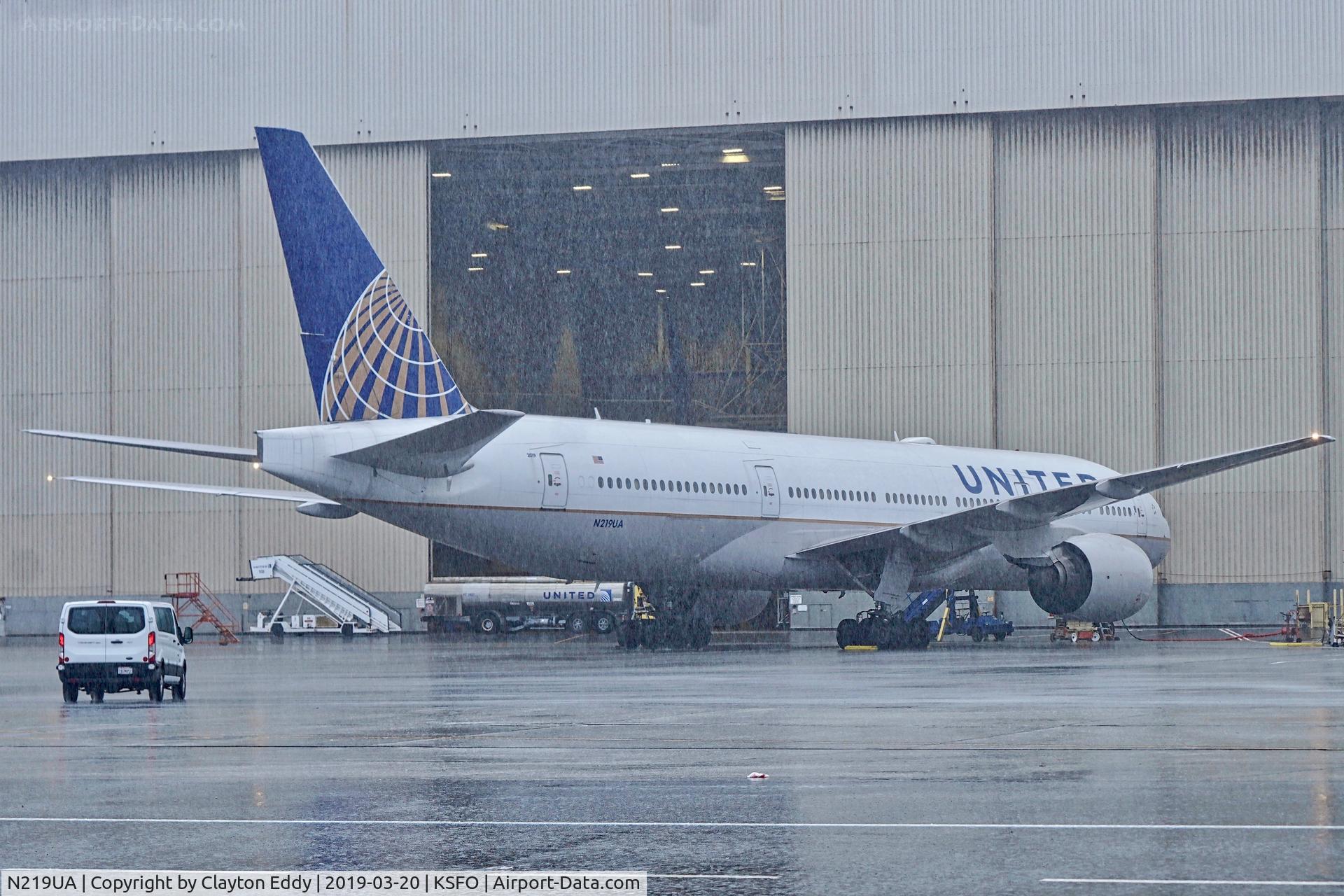 N219UA, 2001 Boeing 777-222 C/N 30551, Rainy day. SFO 2019.