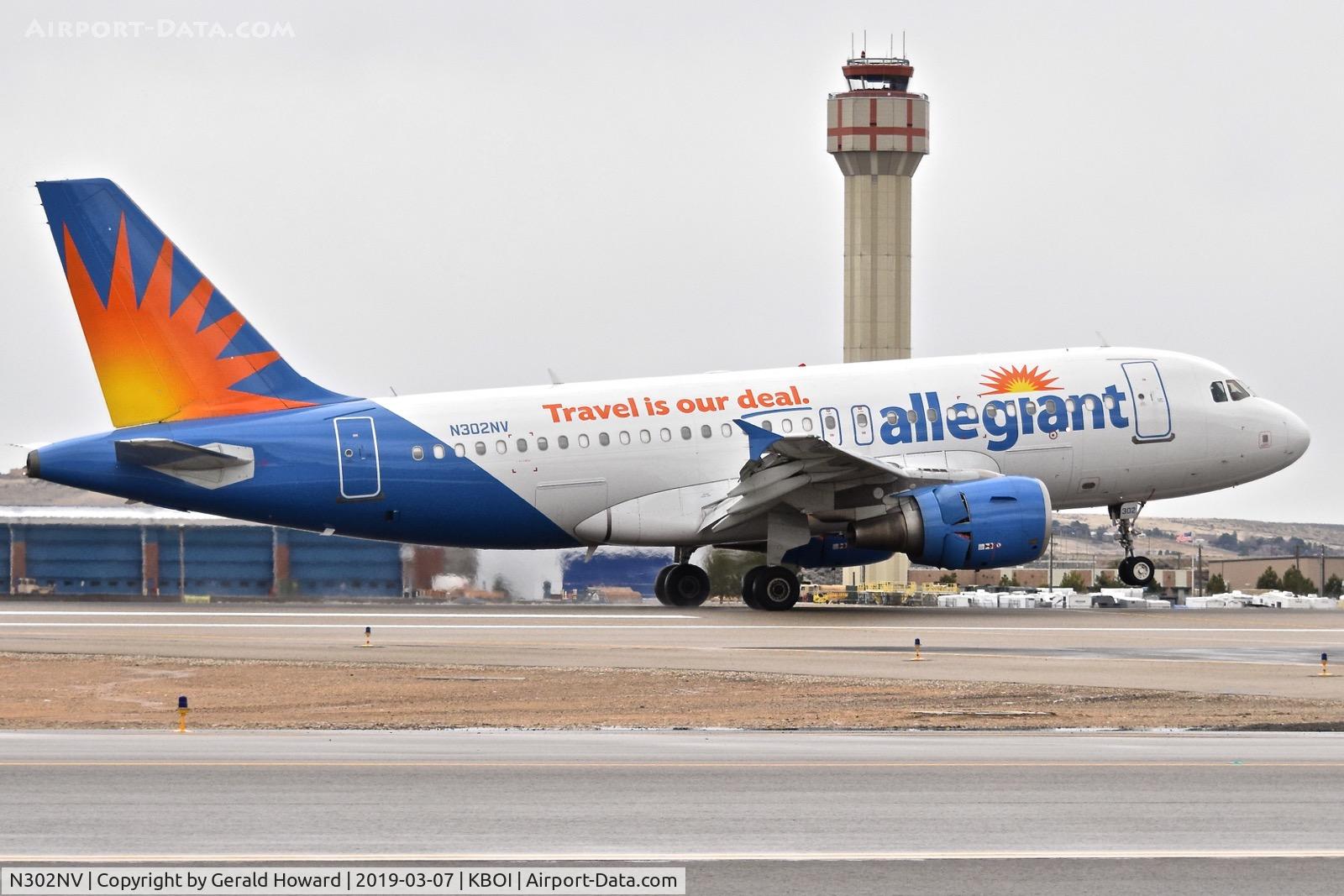 N302NV, 2005 Airbus A319-111 C/N 2387, Landing roll out on RWY 28R.