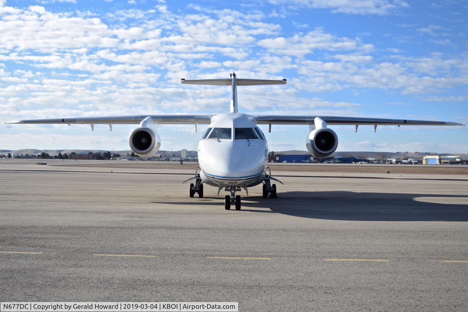 N677DC, 1999 Fairchild Dornier 328-300 328JET C/N 3126, Parked on the north GA ramp.