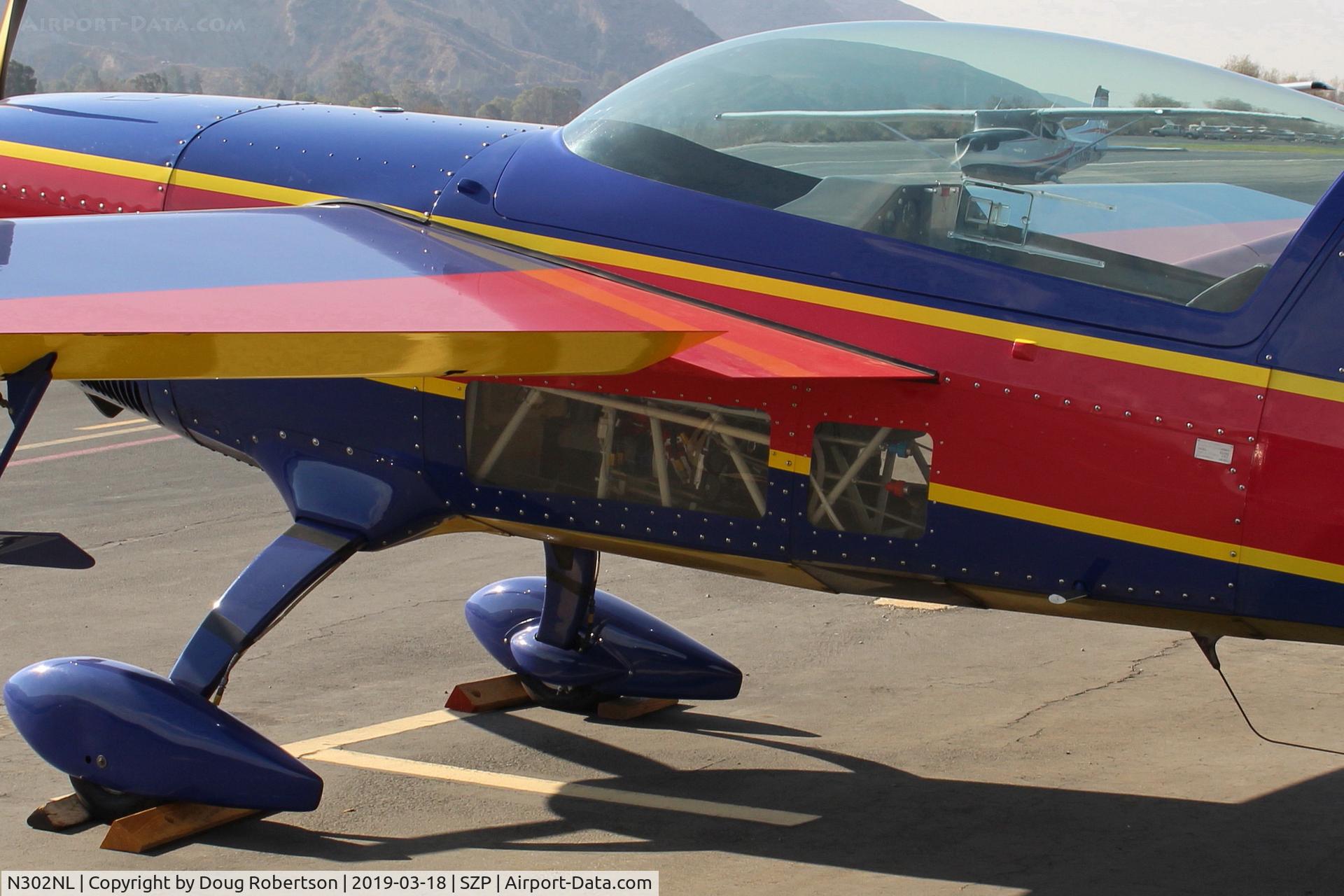 N302NL, 1995 Extra EA-300 C/N 062, 1995 Extra Flugzeugbau EA-300, Lycoming AEIO-540 300 Hp, lower fenestration assures visibility during extreme aerobatics, this is the mid-wing version, a low wing version also available.