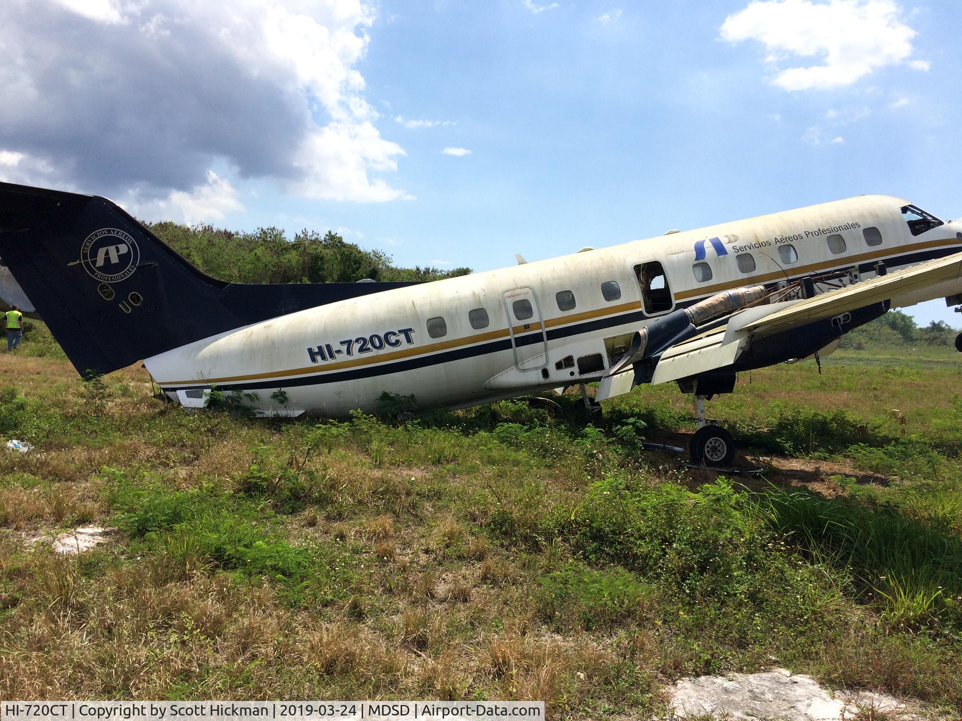 HI-720CT, 1987 Embraer EMB-120RT Brasilia C/N 120038, Derelict at SDQ airport, southwest corner of airport.