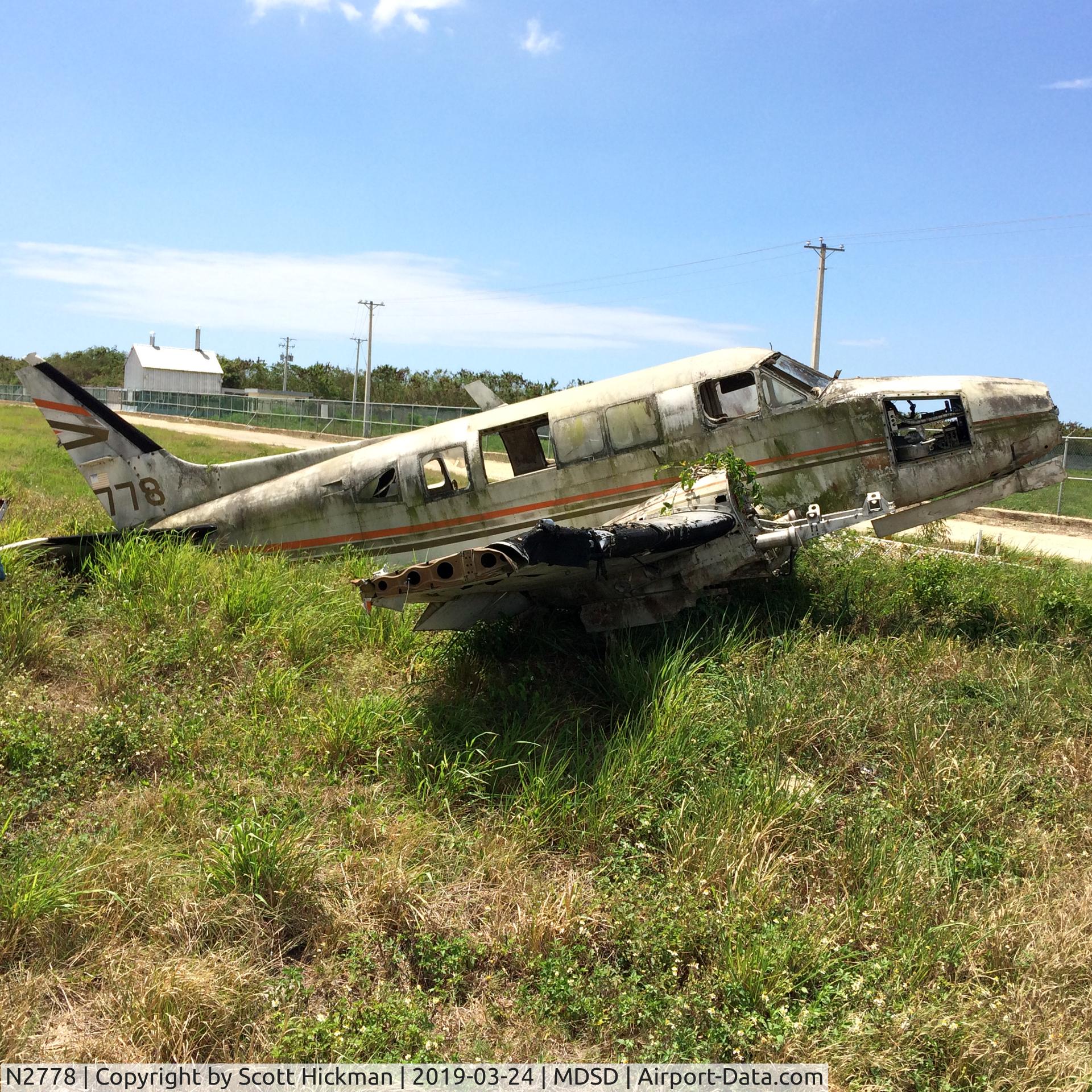 N2778, 1968 Beech A65 Queen Air C/N LC-286, Derelict at SDQ airport, southwest corner of the airport.