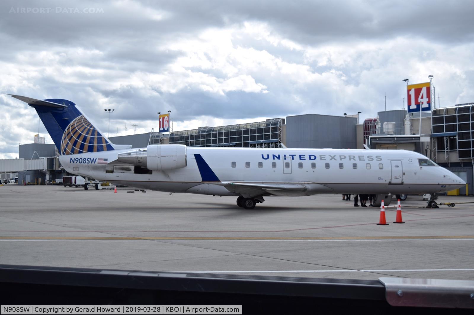 N908SW, 2001 Bombardier CRJ-200LR (CL-600-2B19) C/N 7540, Parked at the gate.