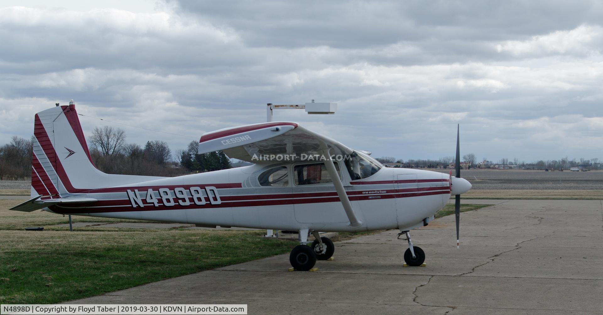 N4898D, 1958 Cessna 182A Skylane C/N 34998, Siting on the General Aviation Ramp