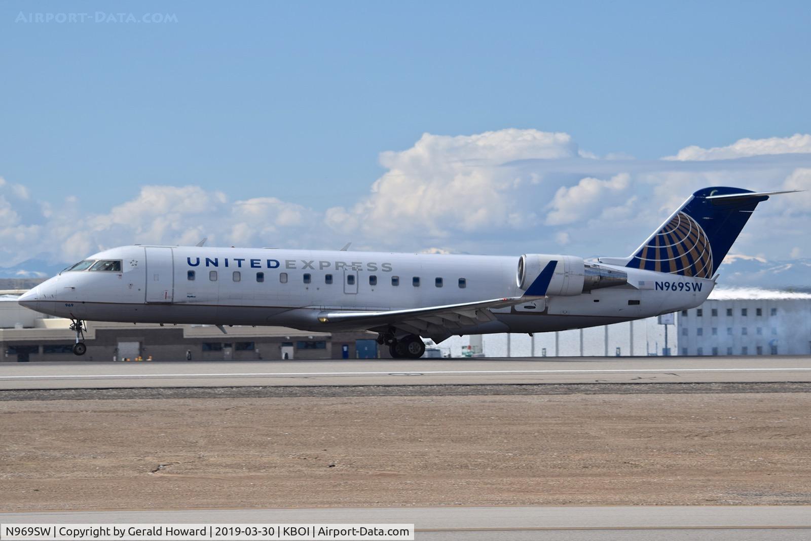 N969SW, 2003 Bombardier CRJ-200ER (CL-600-2B19) C/N 7876, Landing roll out.