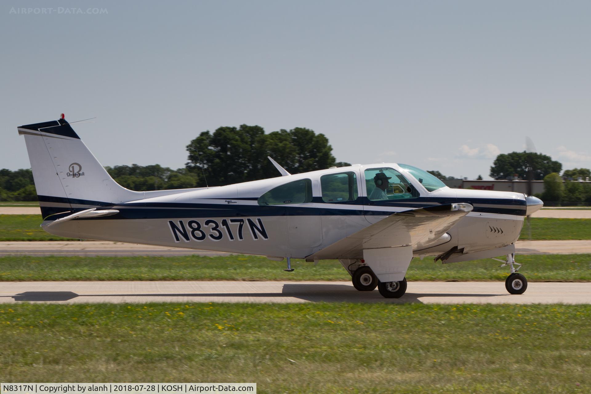 N8317N, 1968 Beech E33 Bonanza C/N CD-1153, Taxying for departure, AirVenture 2018