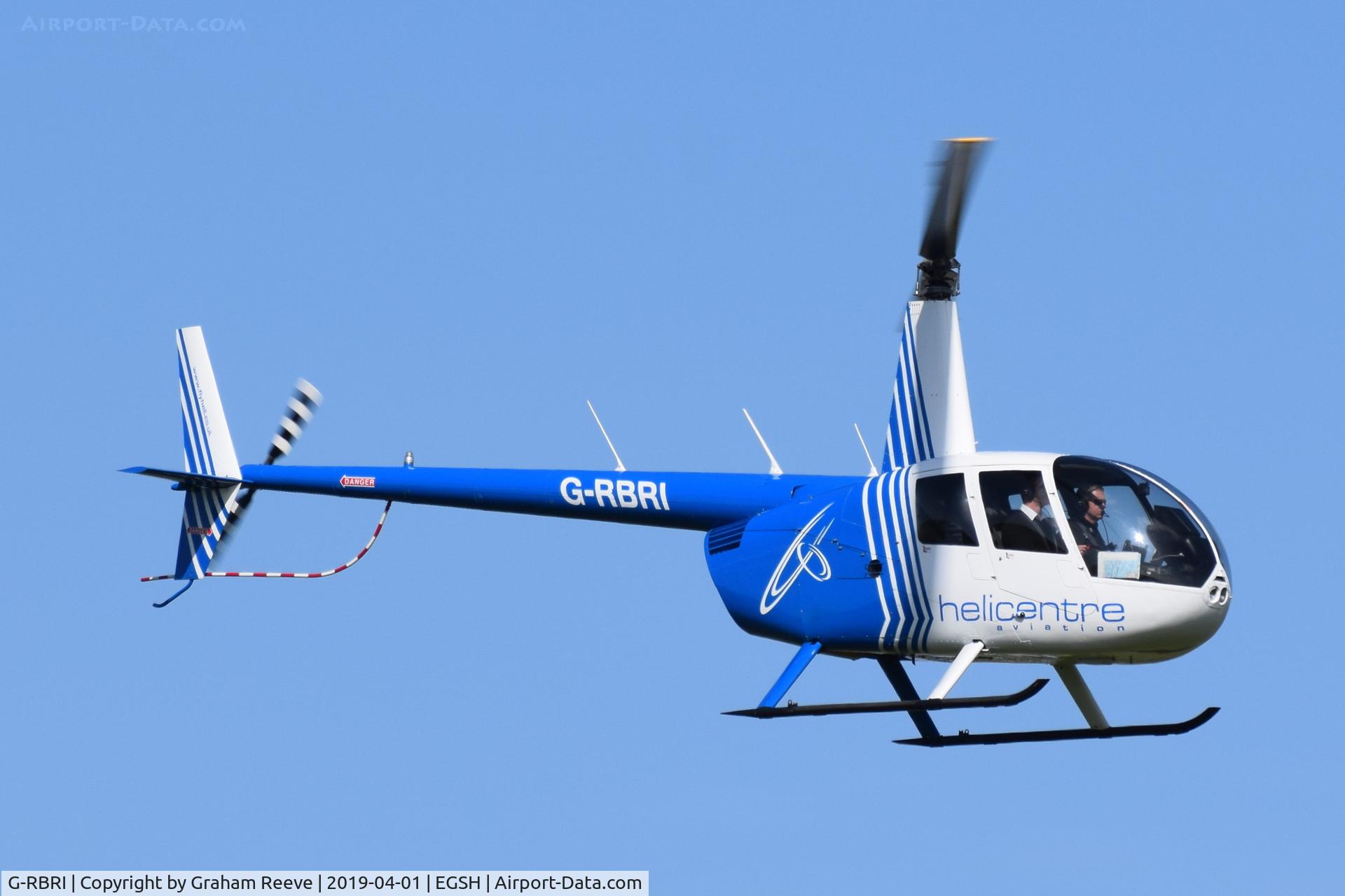G-RBRI, 2007 Robinson R44 Raven II C/N 11963, Landing at Norwich.