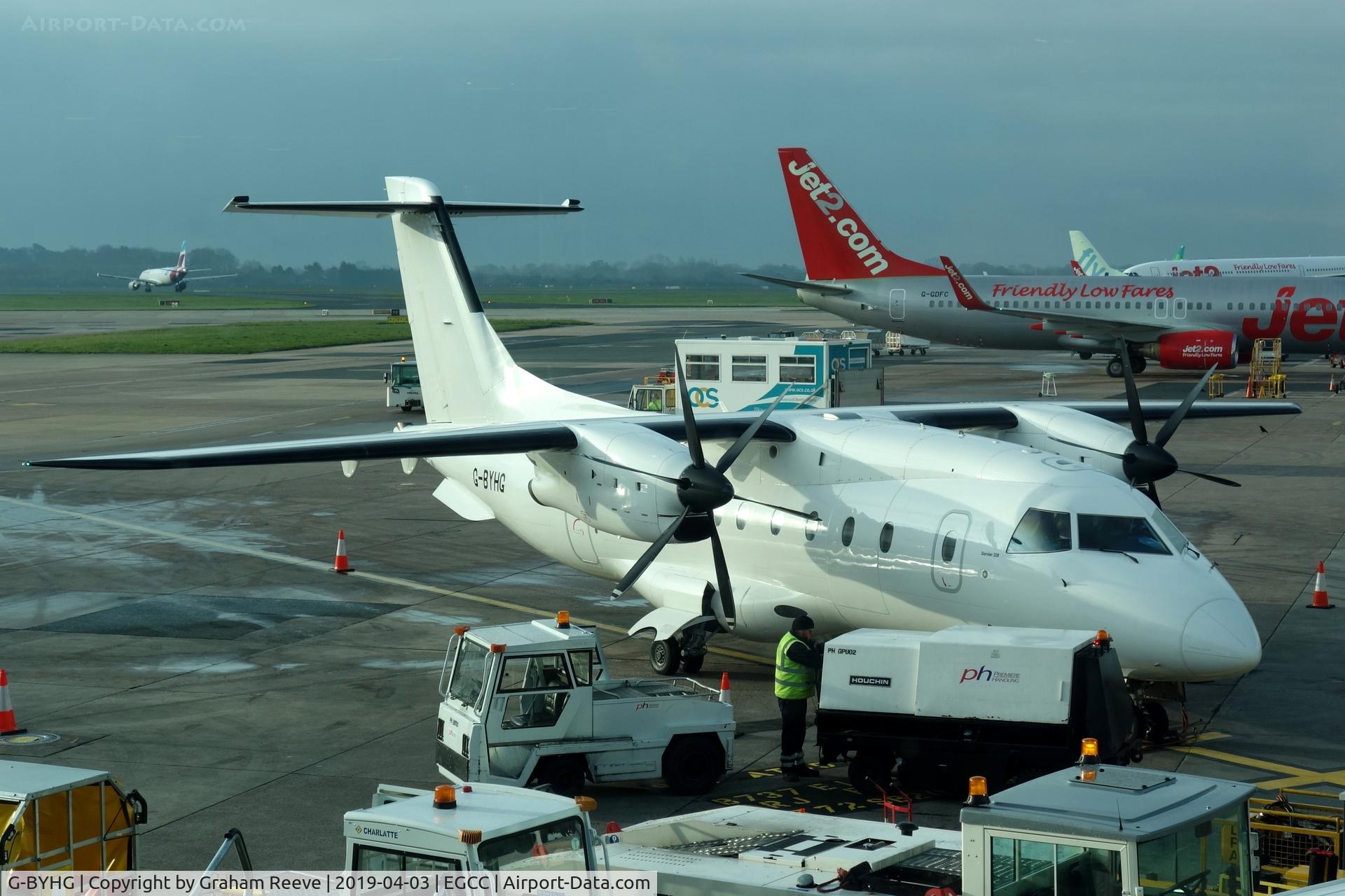 G-BYHG, 1998 Dornier 328-100 C/N 3098, On stand at Manchester.