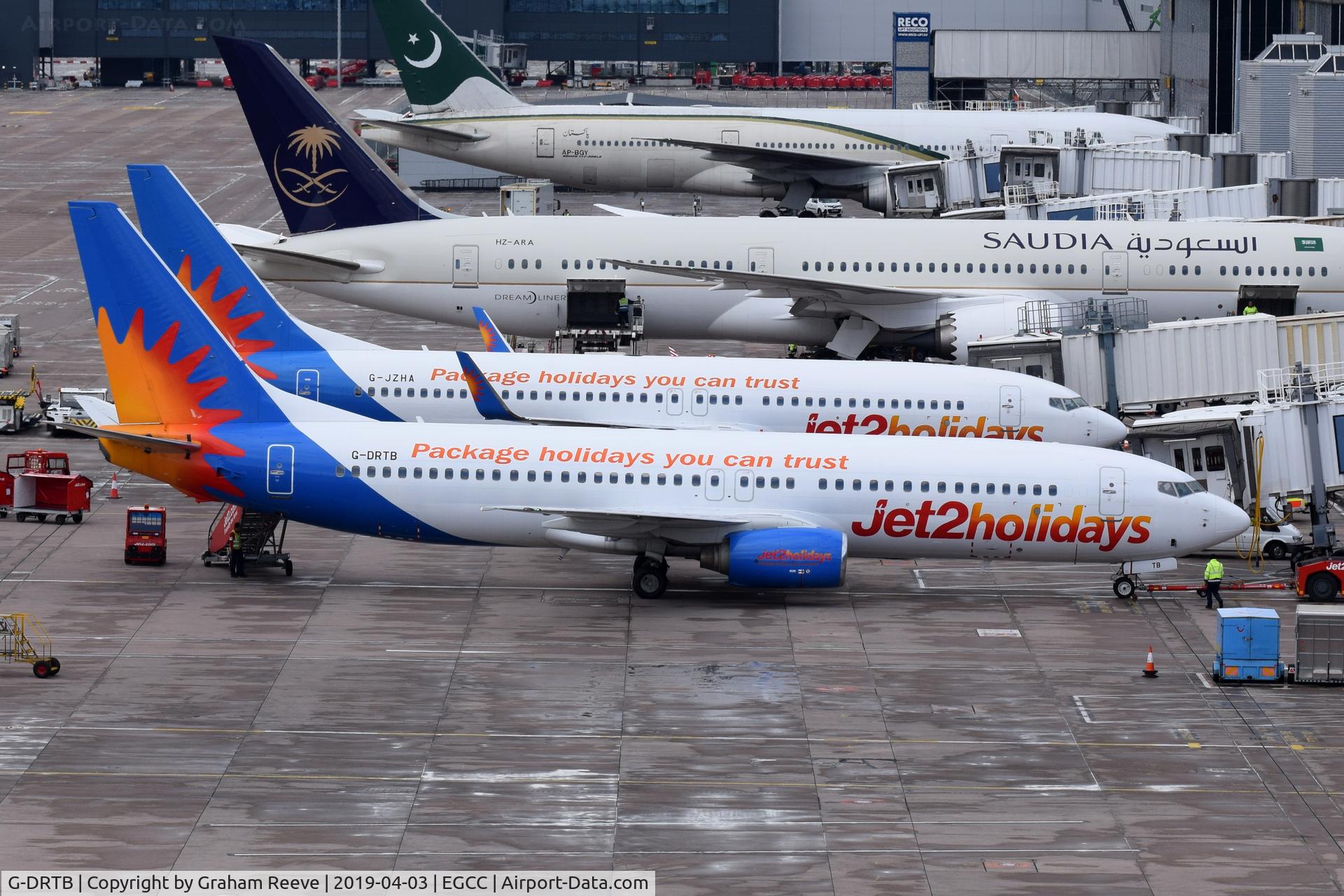 G-DRTB, 1999 Boeing 737-86N C/N 28610, On stand at Manchester.