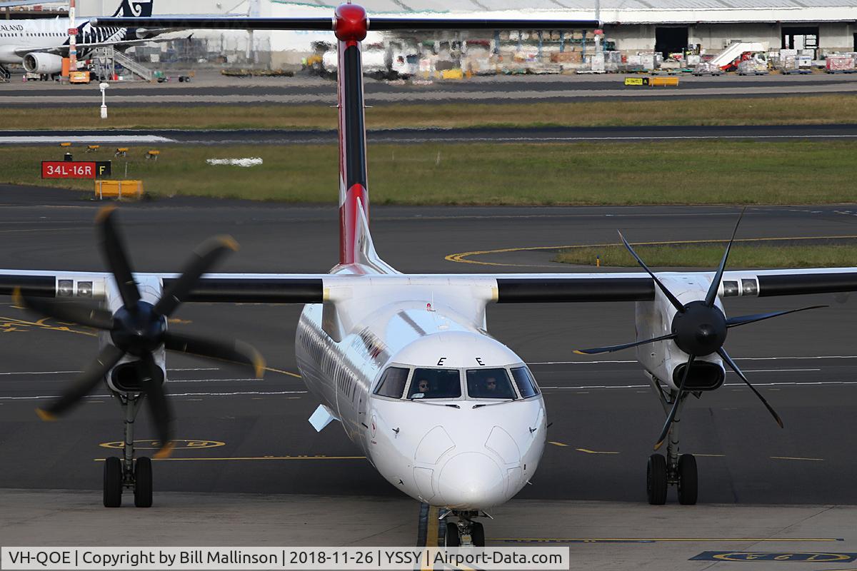 VH-QOE, 2006 De Havilland Canada DHC-8-402Q Dash 8 C/N 4125, to gate