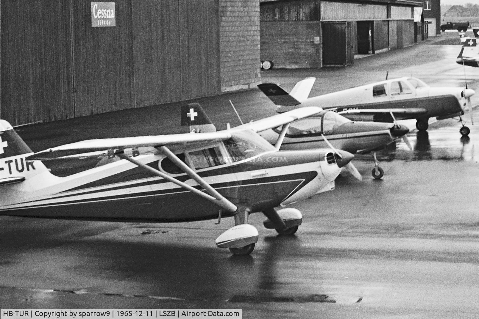 HB-TUR, 1947 Stinson 108-2 Voyager Voyager C/N 108-3105, On a rainy day at Berne-Belp airport. Scanned from a b+W-negative.