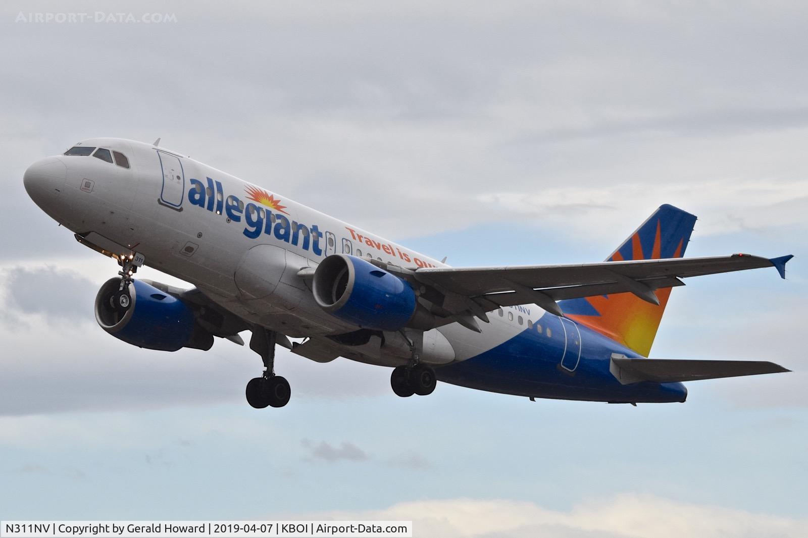 N311NV, 2006 Airbus A319-111 C/N 2702, Climb out from RWY 10L.
