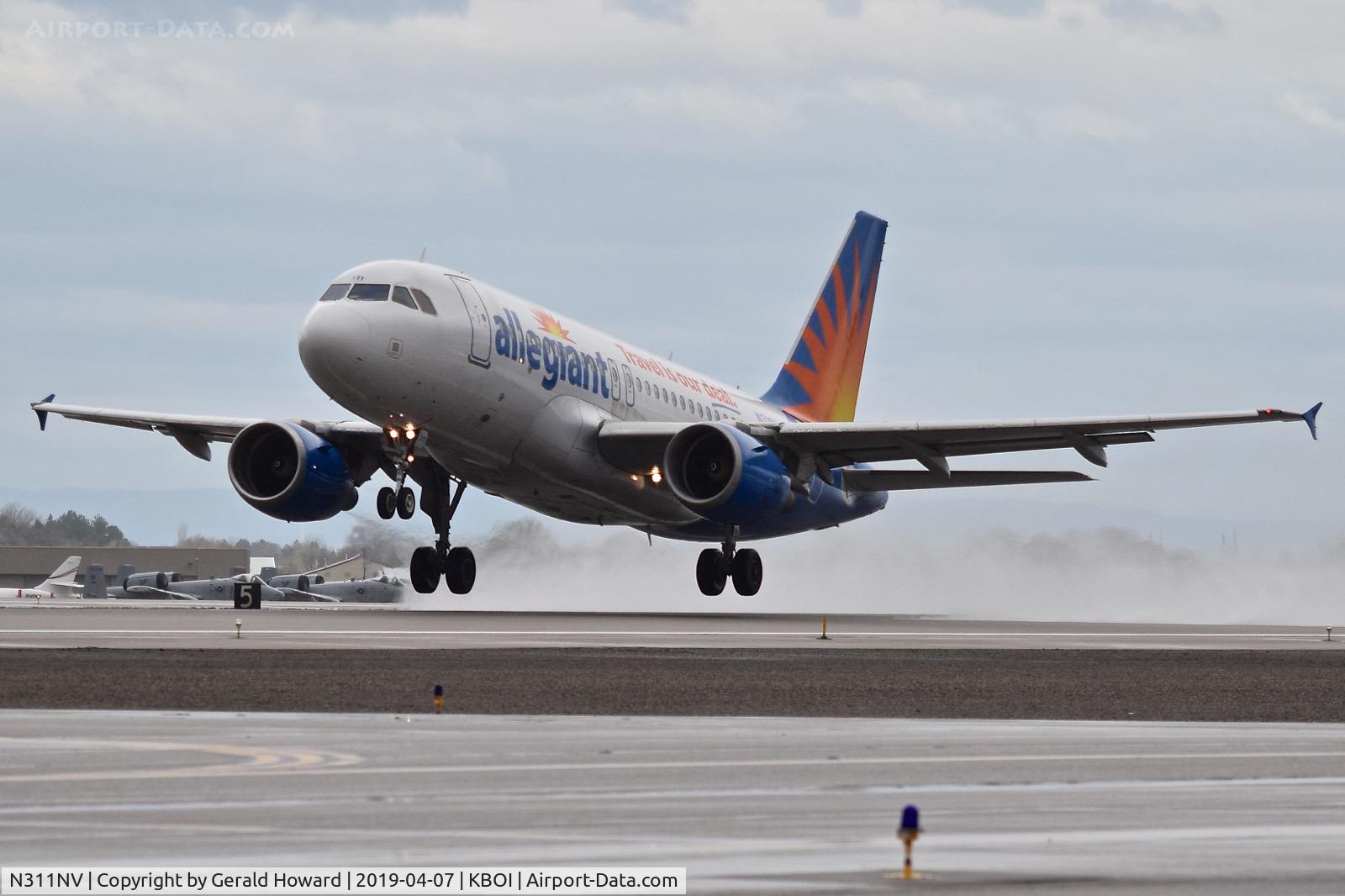 N311NV, 2006 Airbus A319-111 C/N 2702, Take off from RWY 10L.