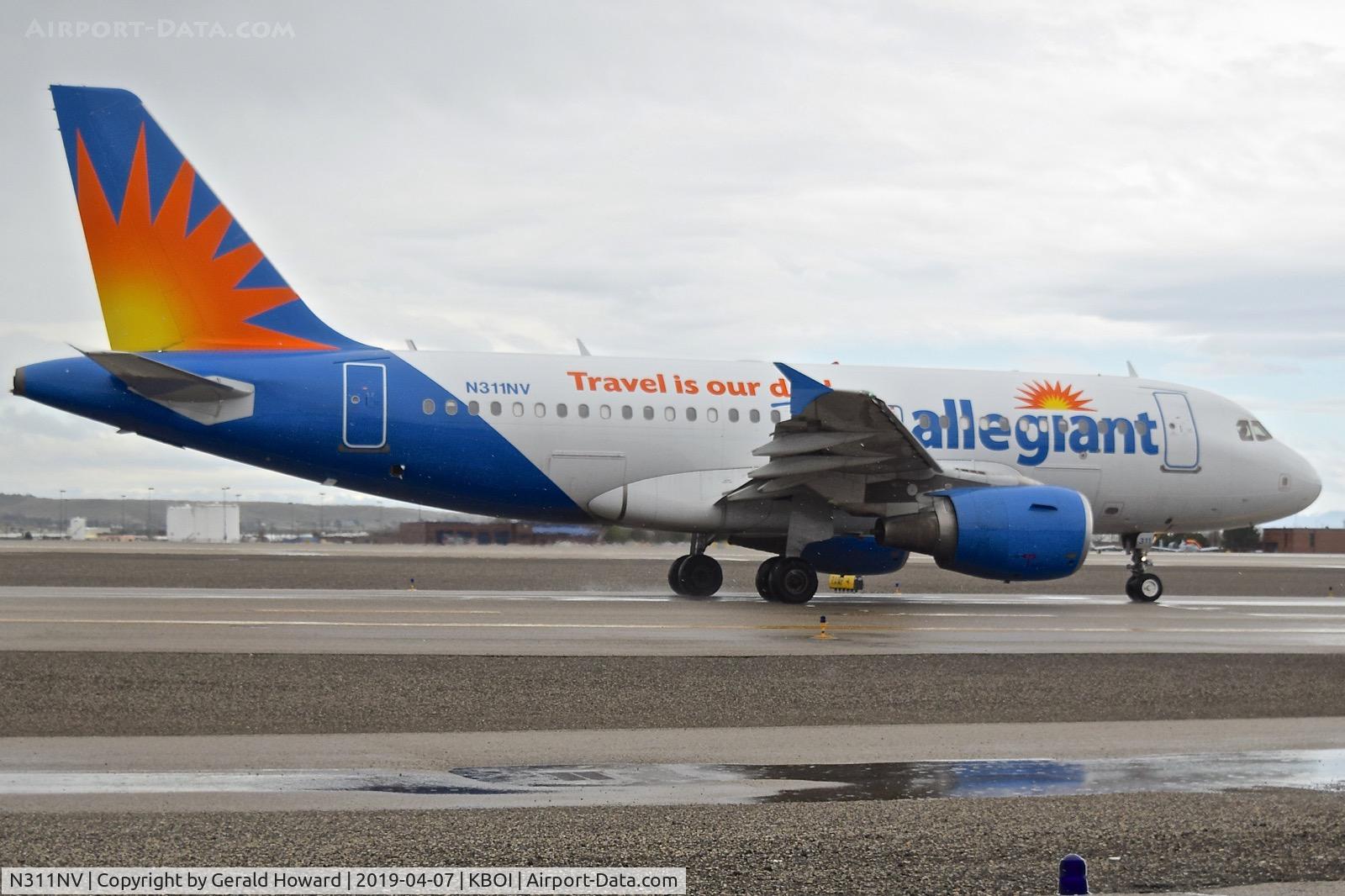 N311NV, 2006 Airbus A319-111 C/N 2702, On Taxiway Alpha for RWY 10L.