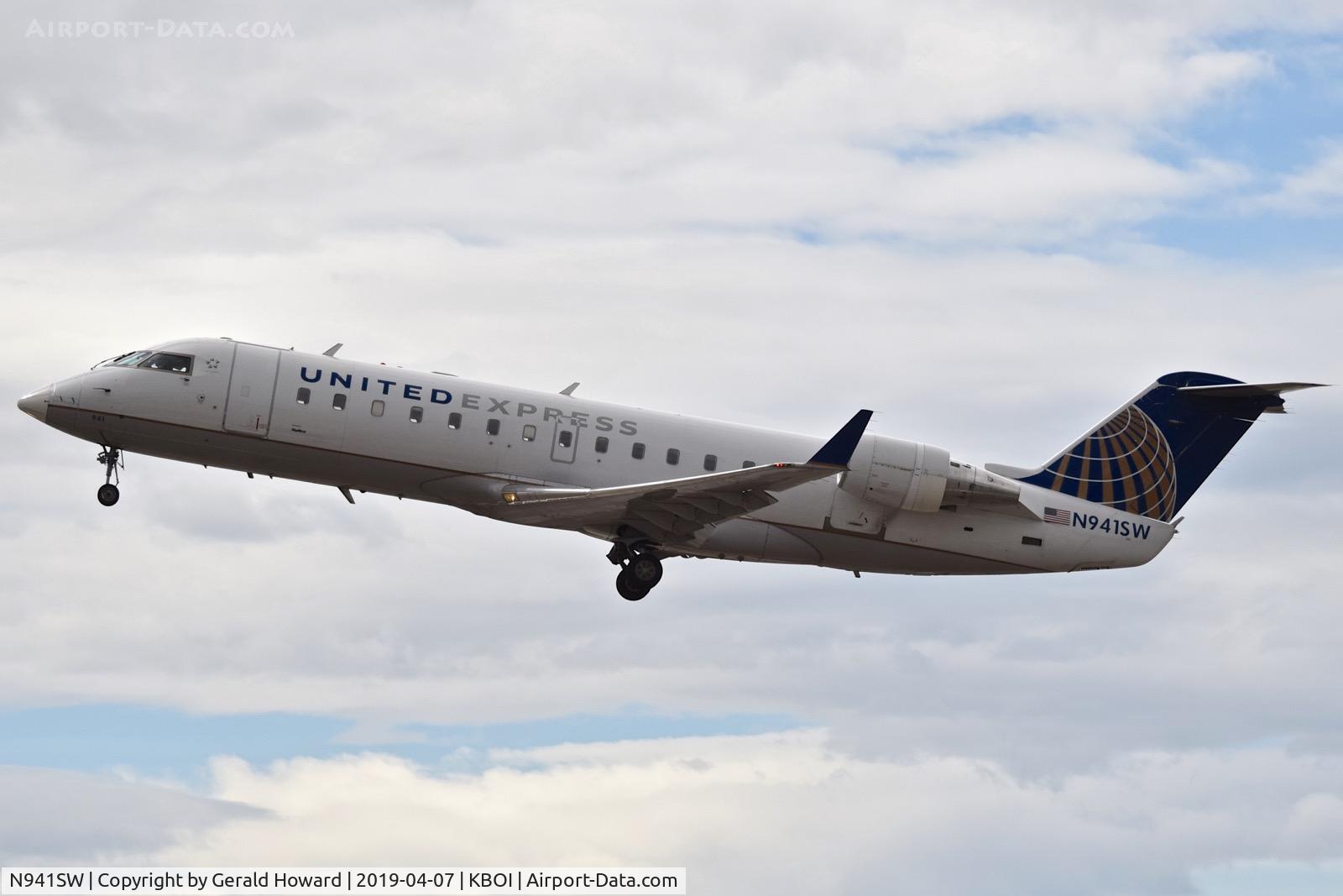 N941SW, 2003 Bombardier CRJ-200LR (CL-600-2B19) C/N 7750, Climb out from RWY 10L.