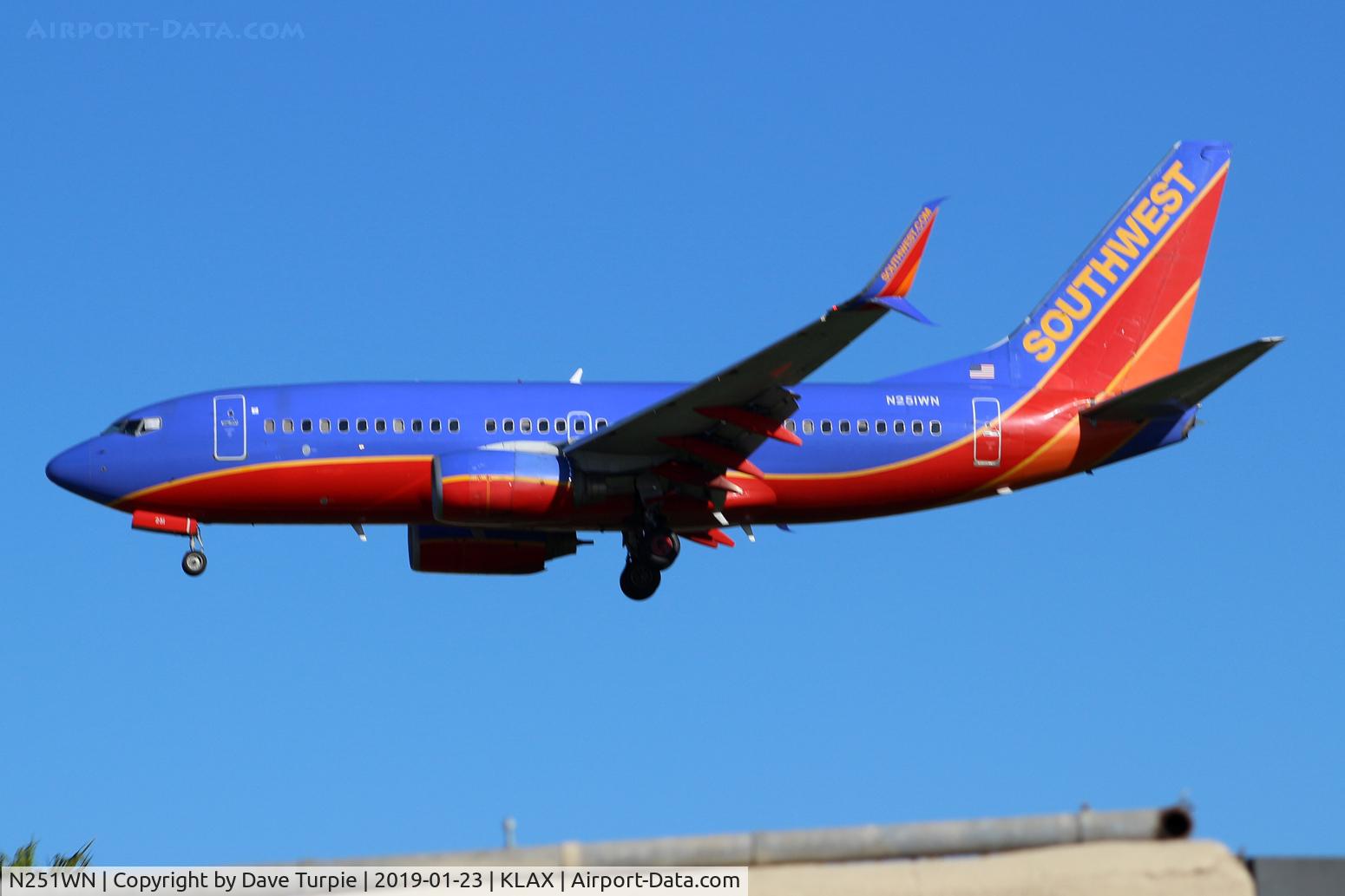N251WN, 2006 Boeing 737-7H4 C/N 32510, N251WN flying over the Proud Bird Restaurant at LAX.