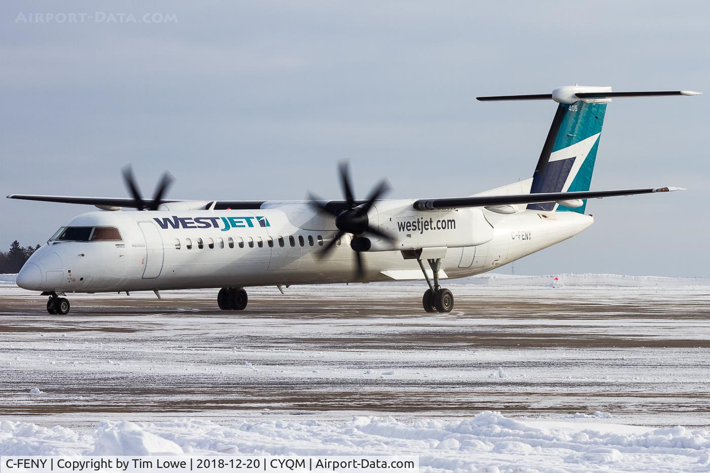 C-FENY, 2013 De Havilland Canada DHC-8-402 Dash 8 C/N 4447, Pulling into CYQM terminal on a snowy day.