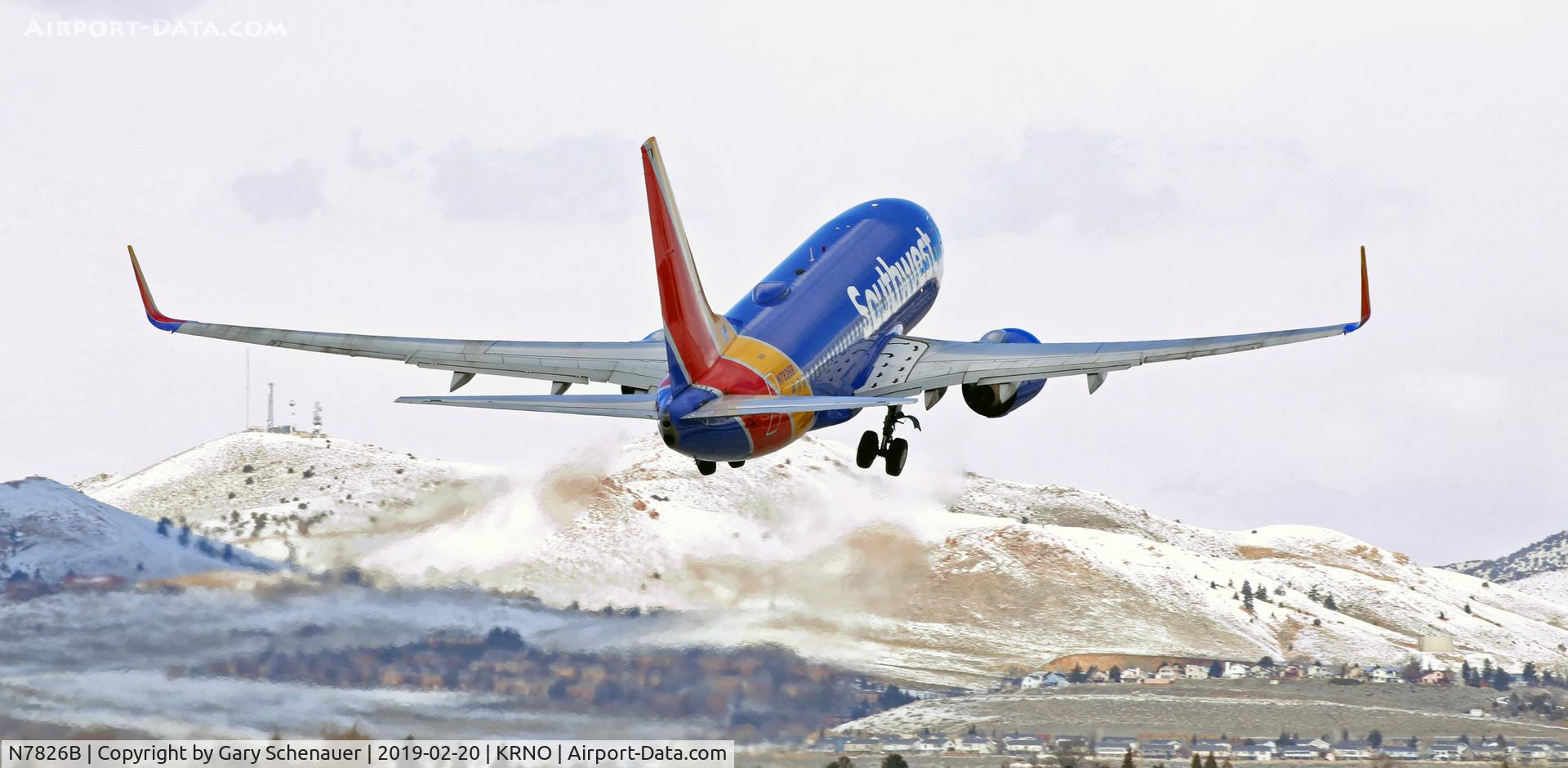 N7826B, 2003 Boeing 737-79P C/N 30035, On the climb away from runway 34R.