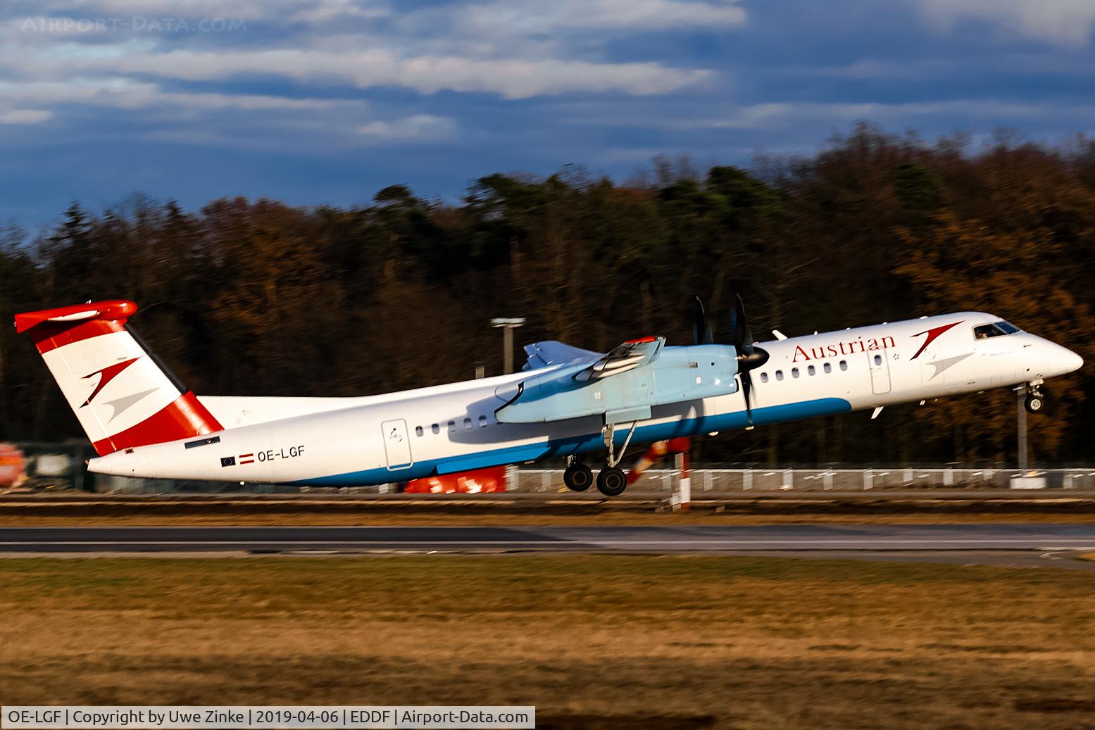 OE-LGF, 2002 De Havilland Canada DHC-8-402Q Dash 8 C/N 4068, evening sun Rwy 18